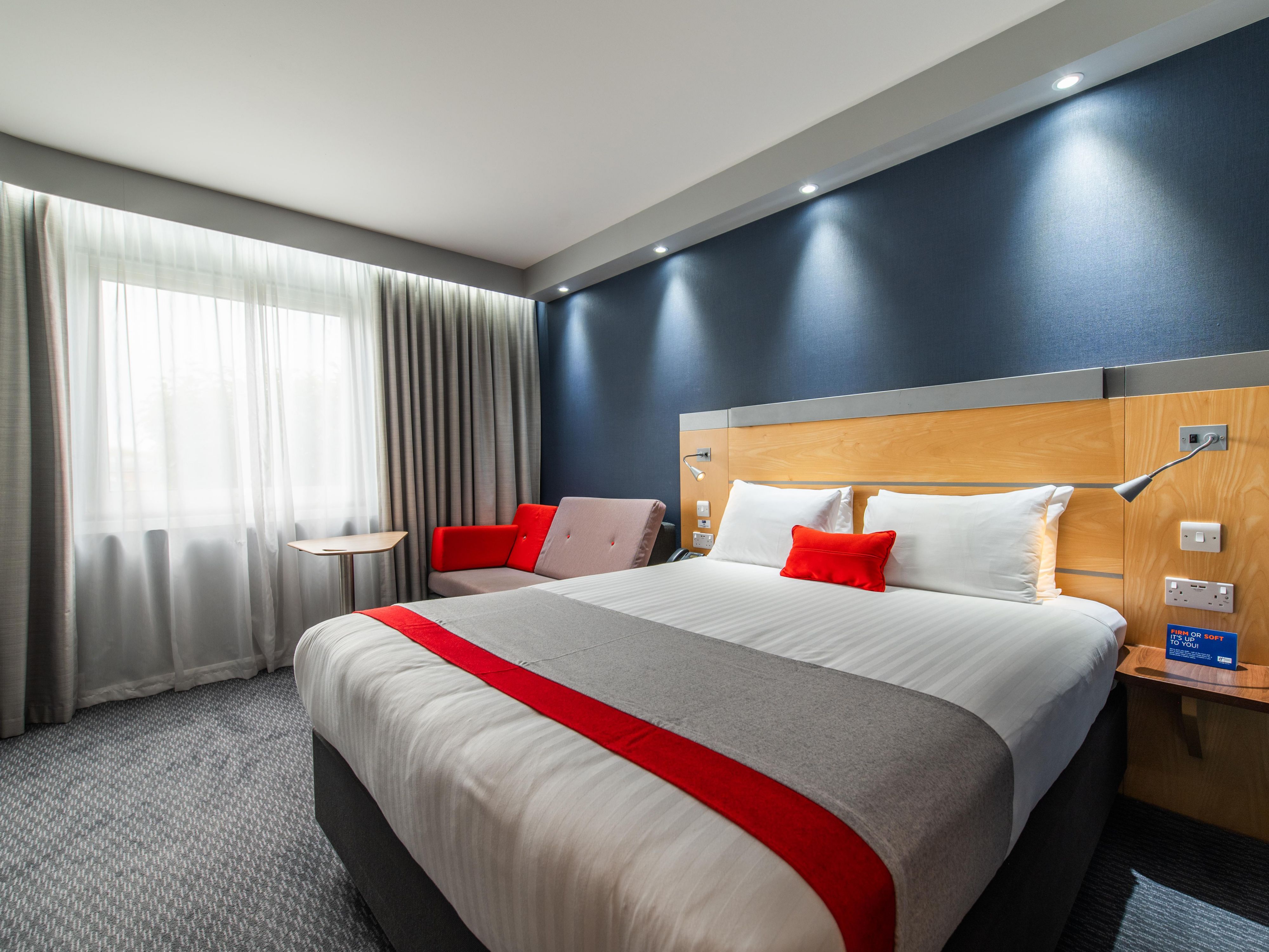 A Ramsgate room with a double bed and a sofa bed