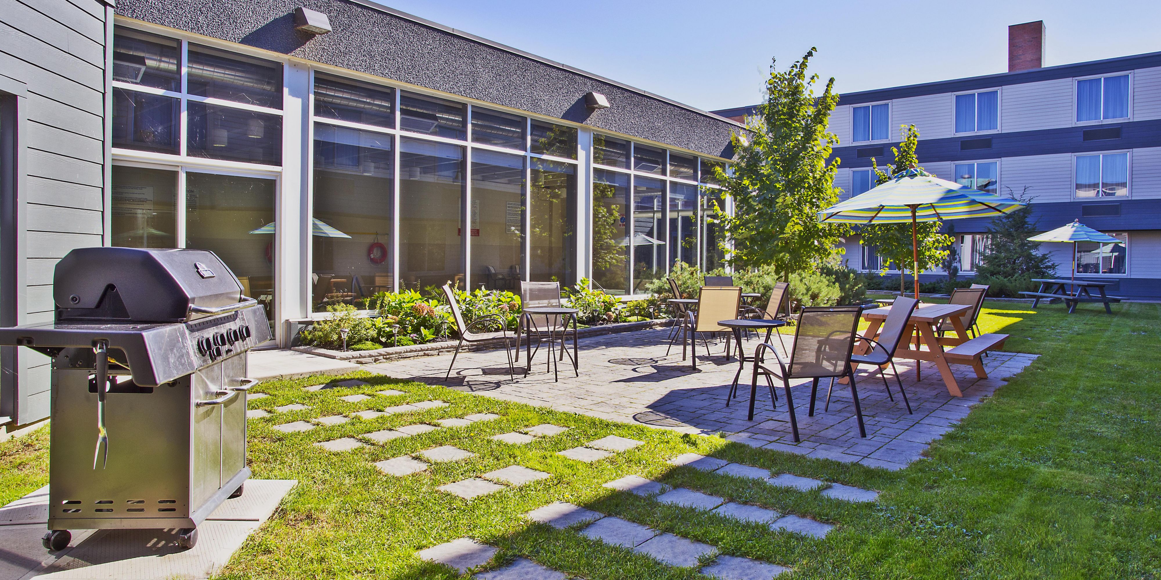 Enjoy the morning sunlight with a cup of coffee, or grab a seat at a picnic table- Our Indoor Pool Area opens onto a beautiful, enclosed Outdoor Courtyard. Call and speak with our Front Desk staff for more information.