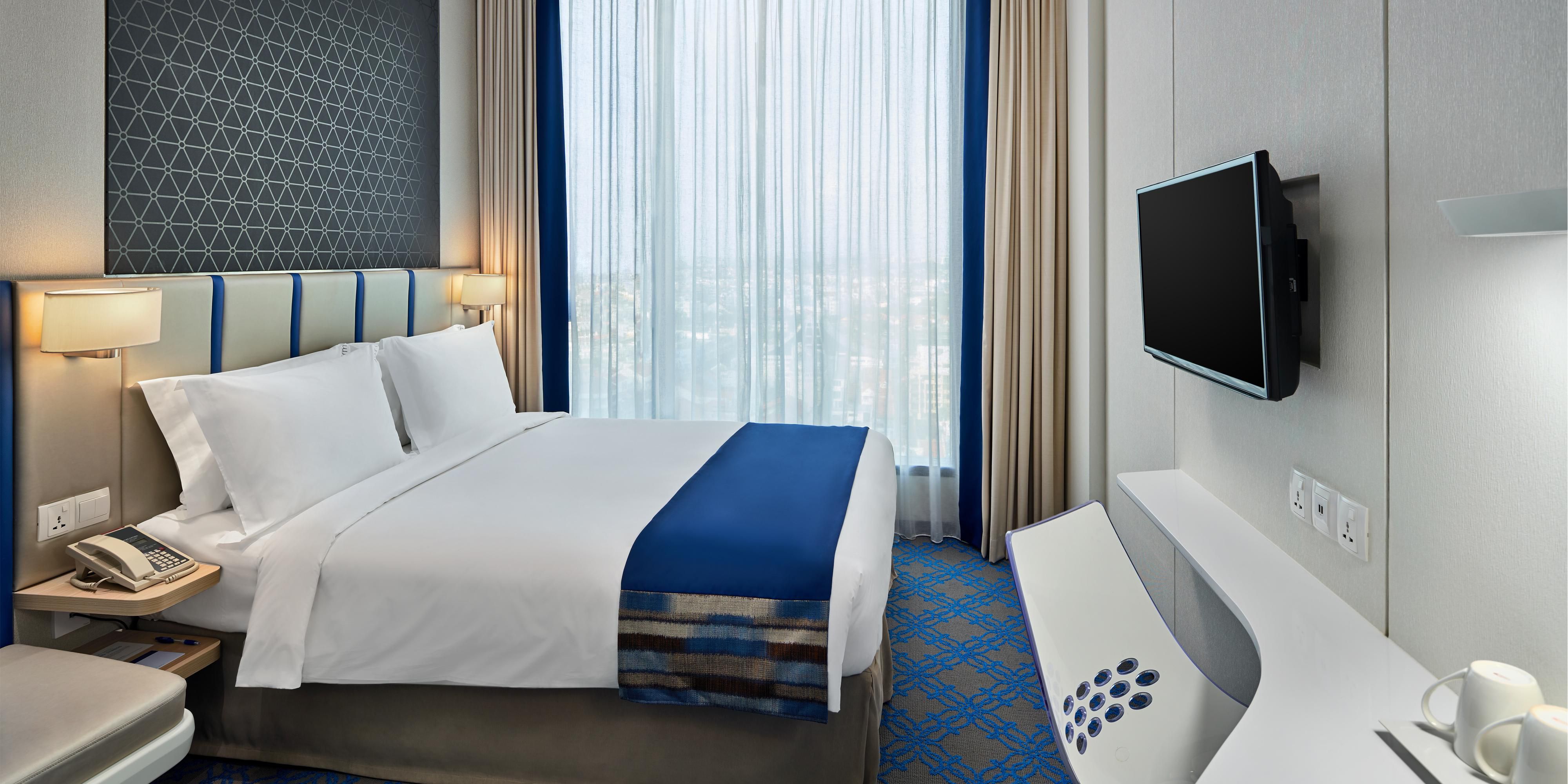 Simple, Smart travel is relaxing and recharging in our contemporary styled rooms with signature bedding, crisp white linen & a choice of soft & frim pillows that assures a good night sleep.