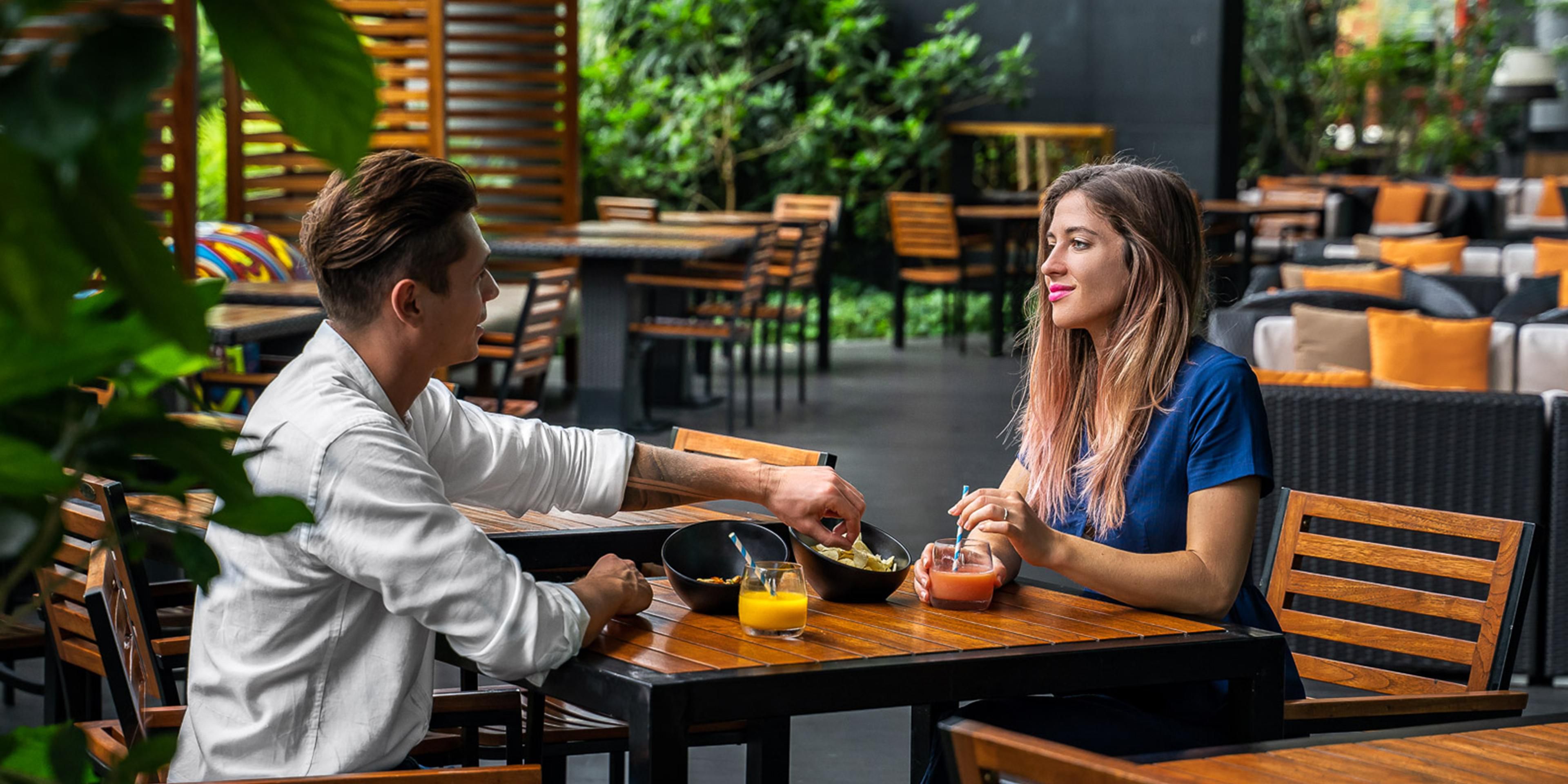 A multi-purpose outdoor space filled with lush greeneries and comfortable cabanas seatings for breakfast dining, event spaces, co-working spaces and more.