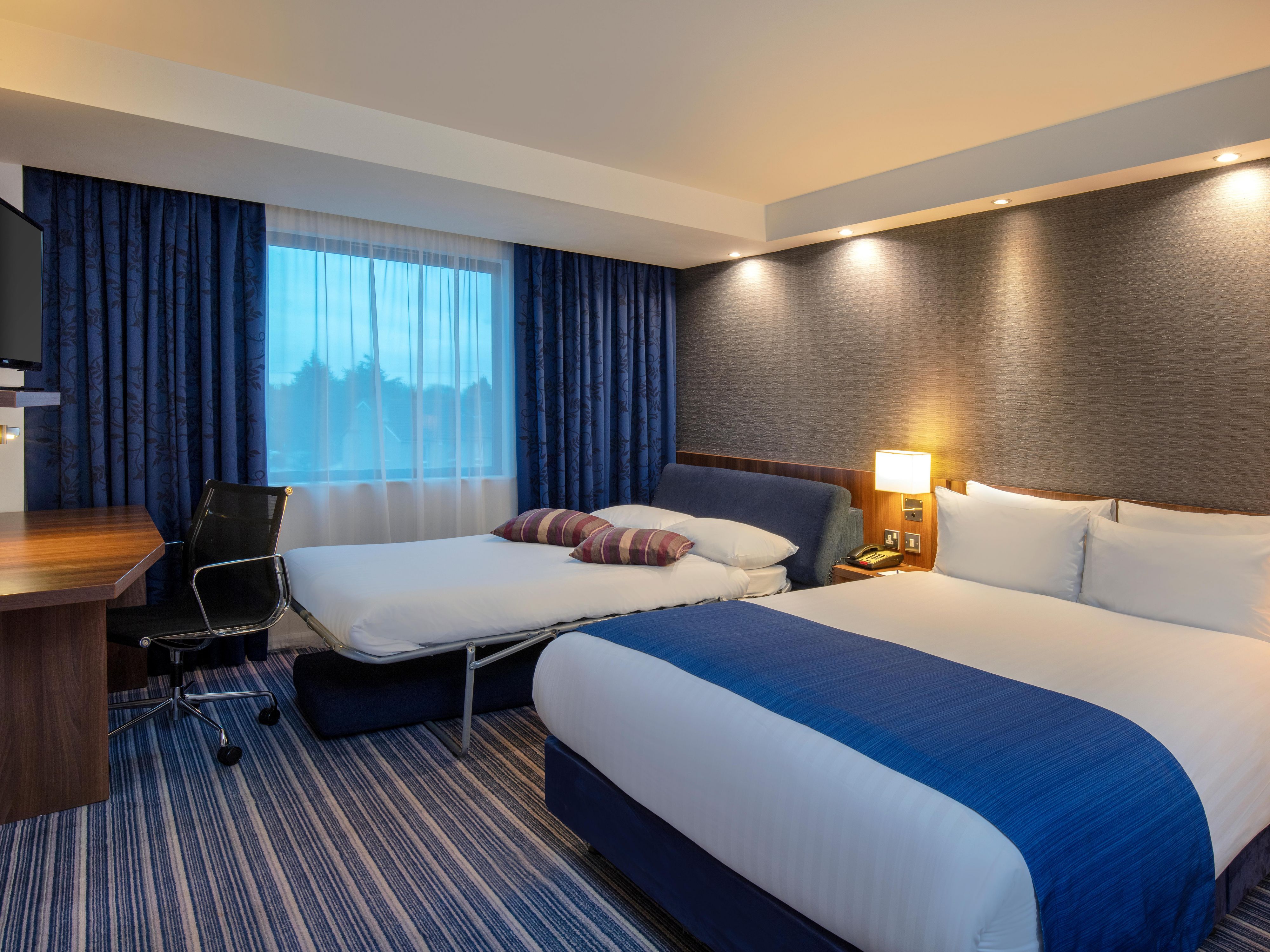 Our spacious Family Rooms are air-conditioned, accommodating up to two adults and two children, with the option of interconnecting rooms if more space is required. Children’s channels available to keep the kids entertained.
