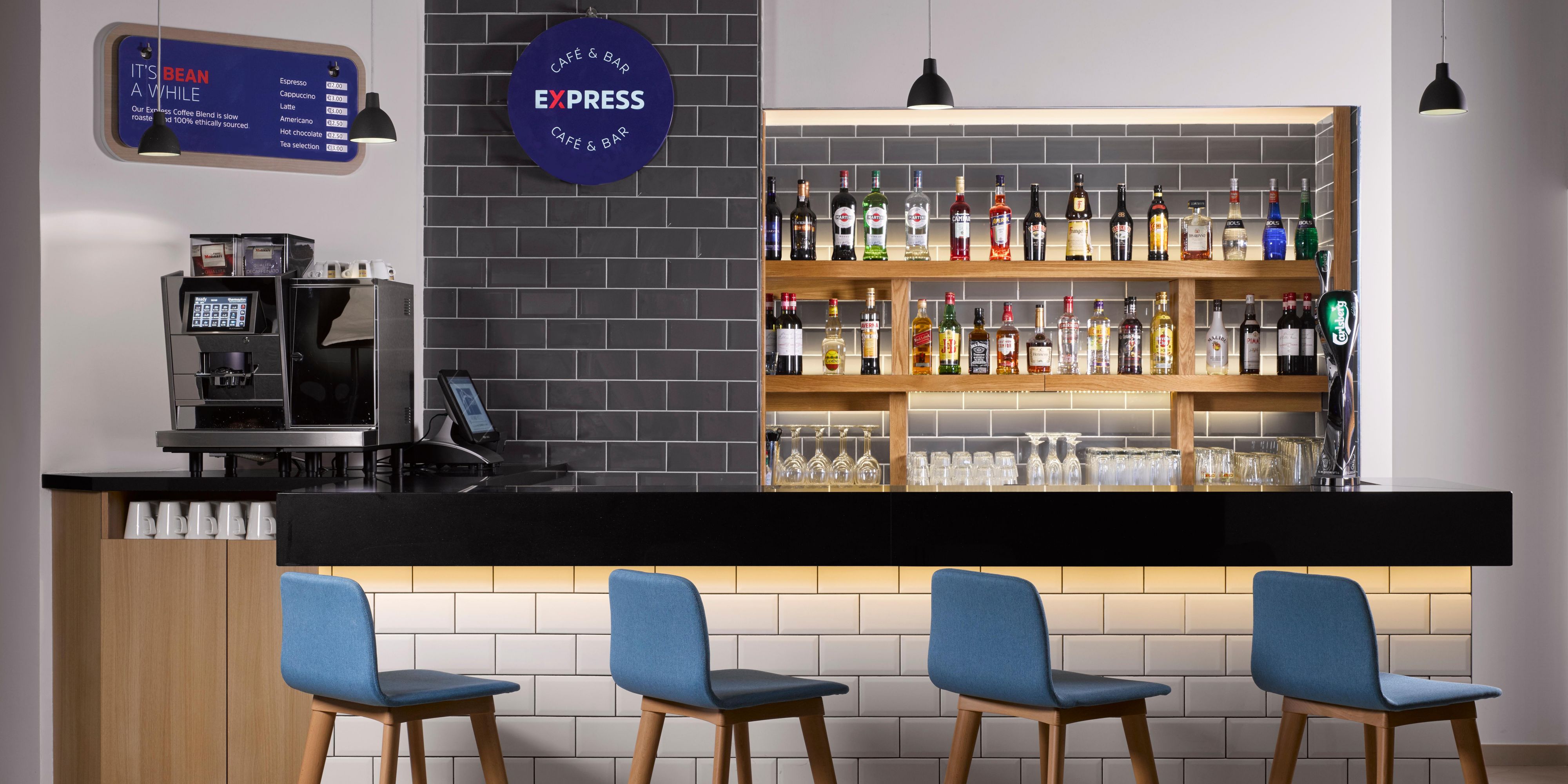 Indulge in a delightful array of drinks at our stylish hotel bar, the Express Café & Bar. From refreshing cocktails to fine wines, there's something for everyone to enjoy. Join us for a relaxing evening of drinks and good company. We look forward to welcoming you to our vibrant bar.