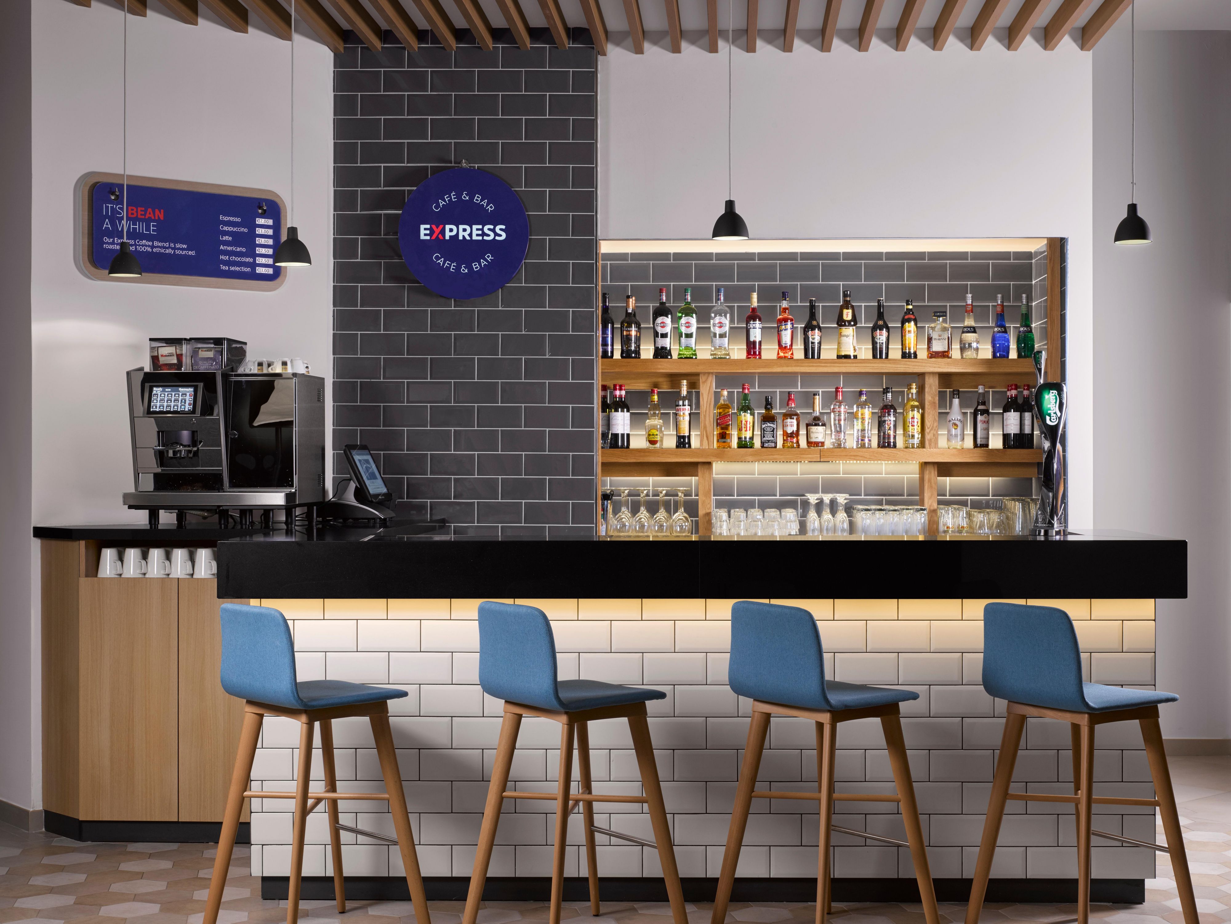 Indulge in a delightful array of drinks at our stylish hotel bar, the Express Café & Bar. We look forward to welcoming you to our vibrant bar.