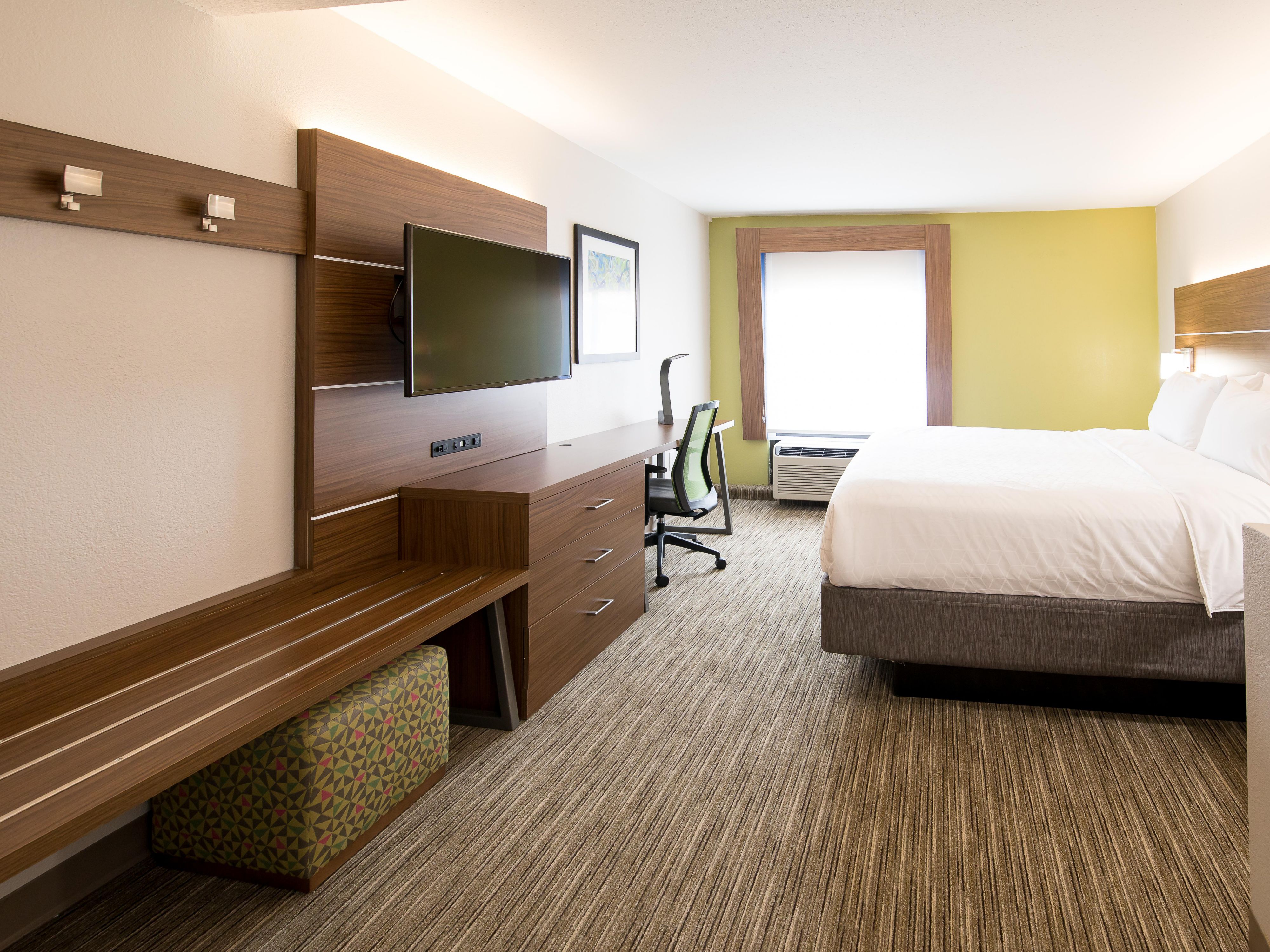 Guest Room Featuring One King Bed & 43" Flat Screen TV