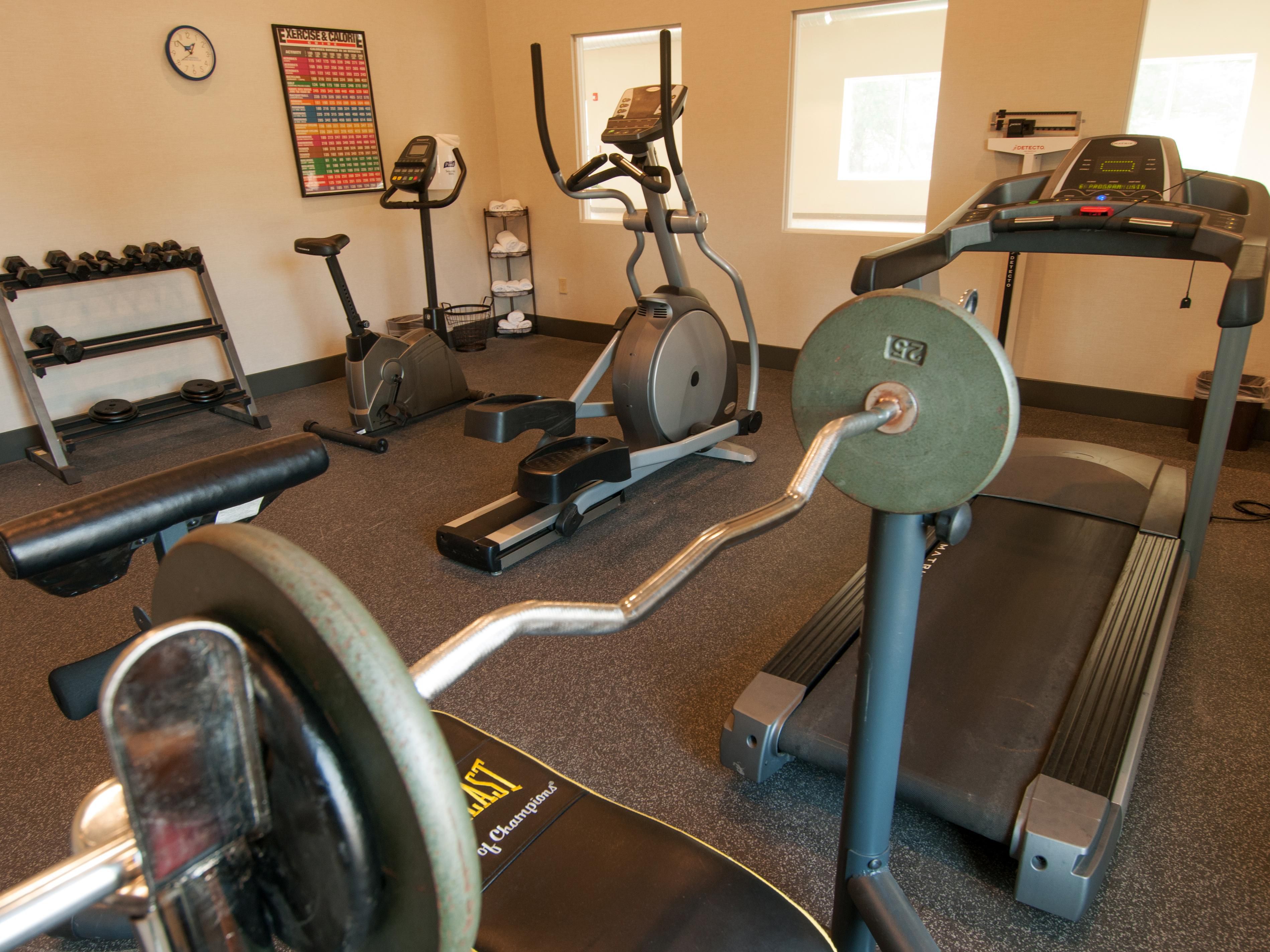 Fitness Center. Open 24 hours. Cardio machines, weights, yoga mats