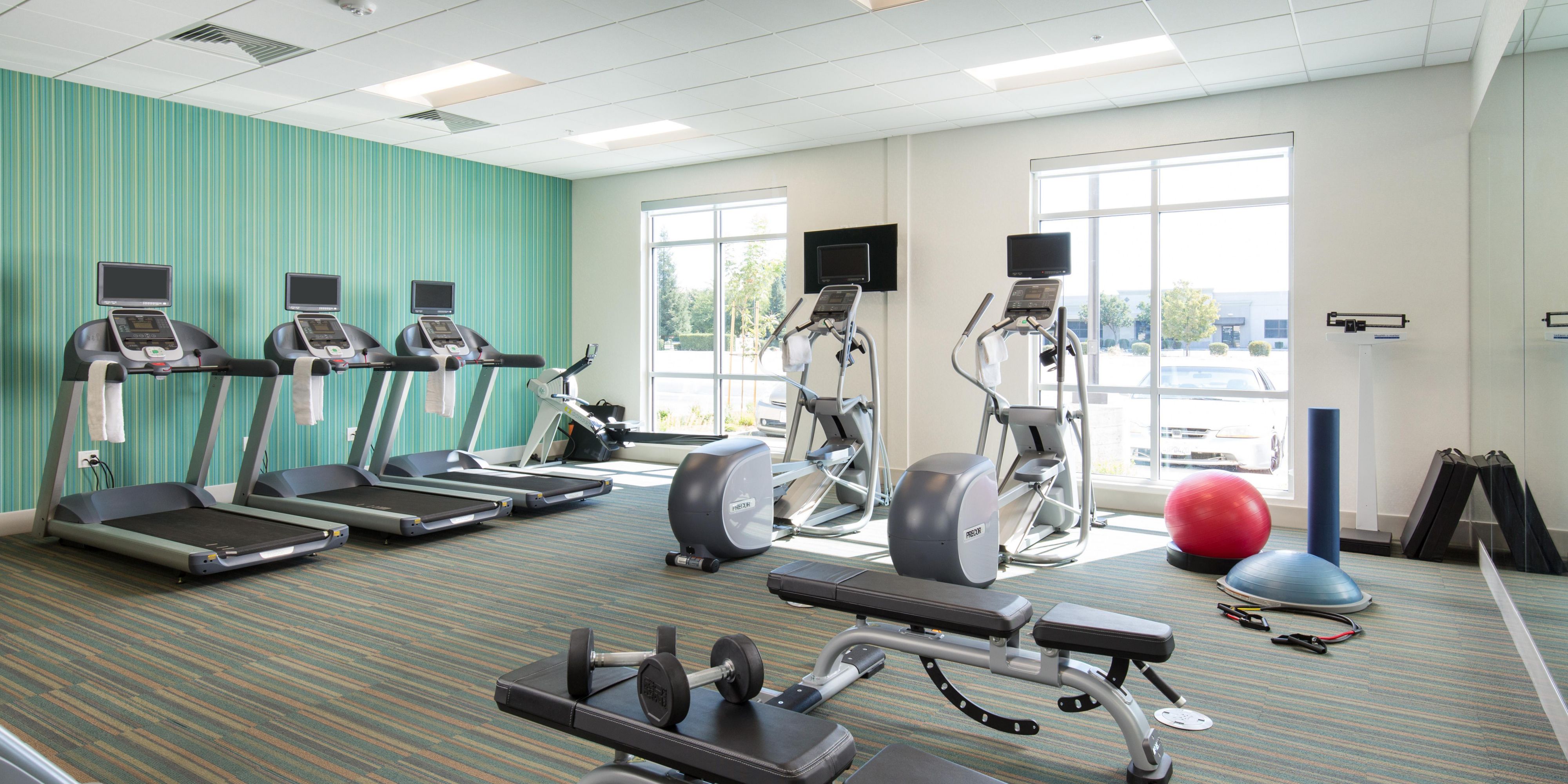Turbocharge your energy in our modern fitness center with state-of-the-art strength training equipment, yoga balls, and cardio machines.