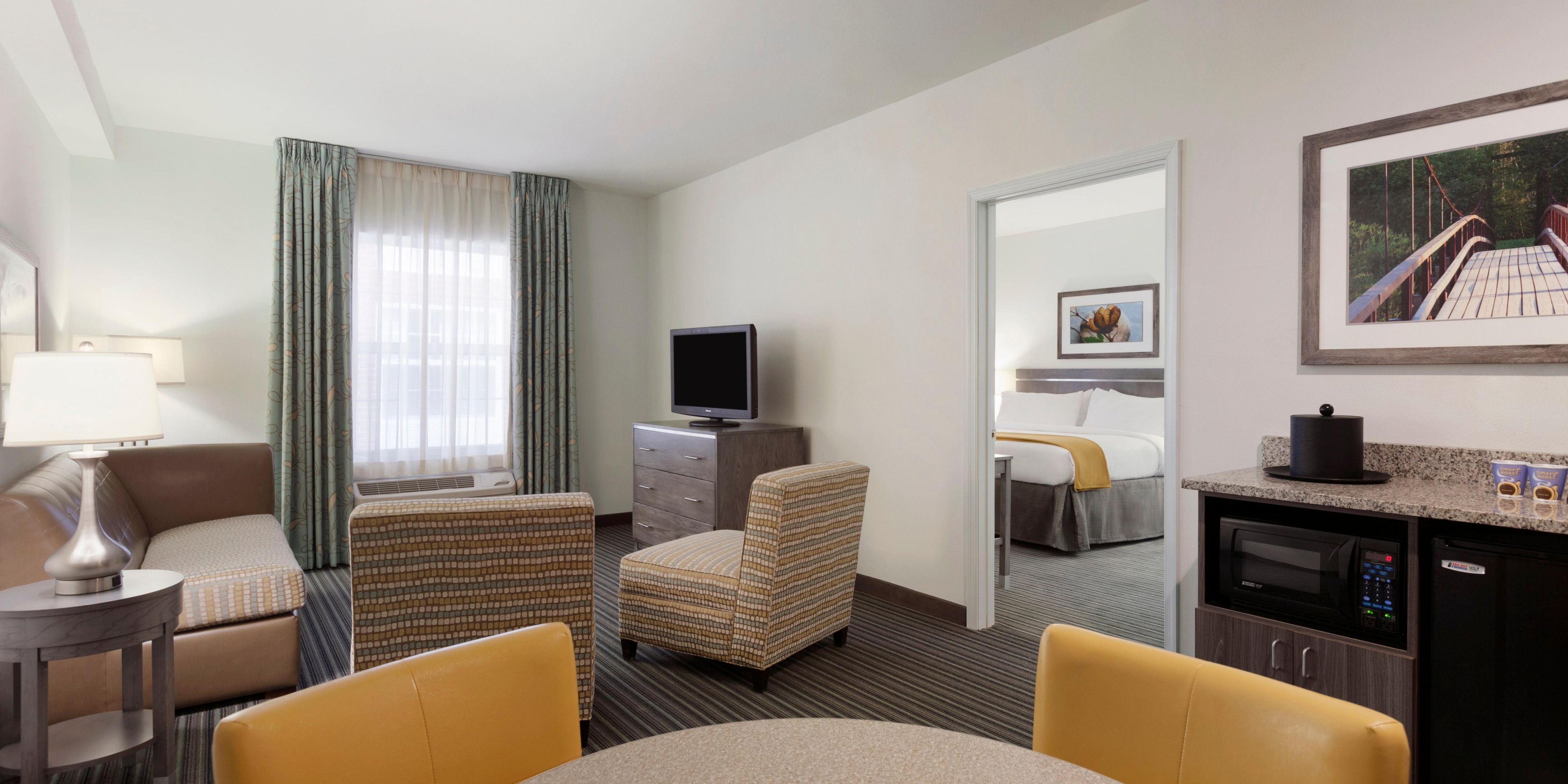 Our Suites & Executive Room Layouts are designed to make you feel at home with a separate living area with a sleeper sofa and a 37 inch HD TV with HBO a microwave and fridge add extra value and free high-speed wireless. 