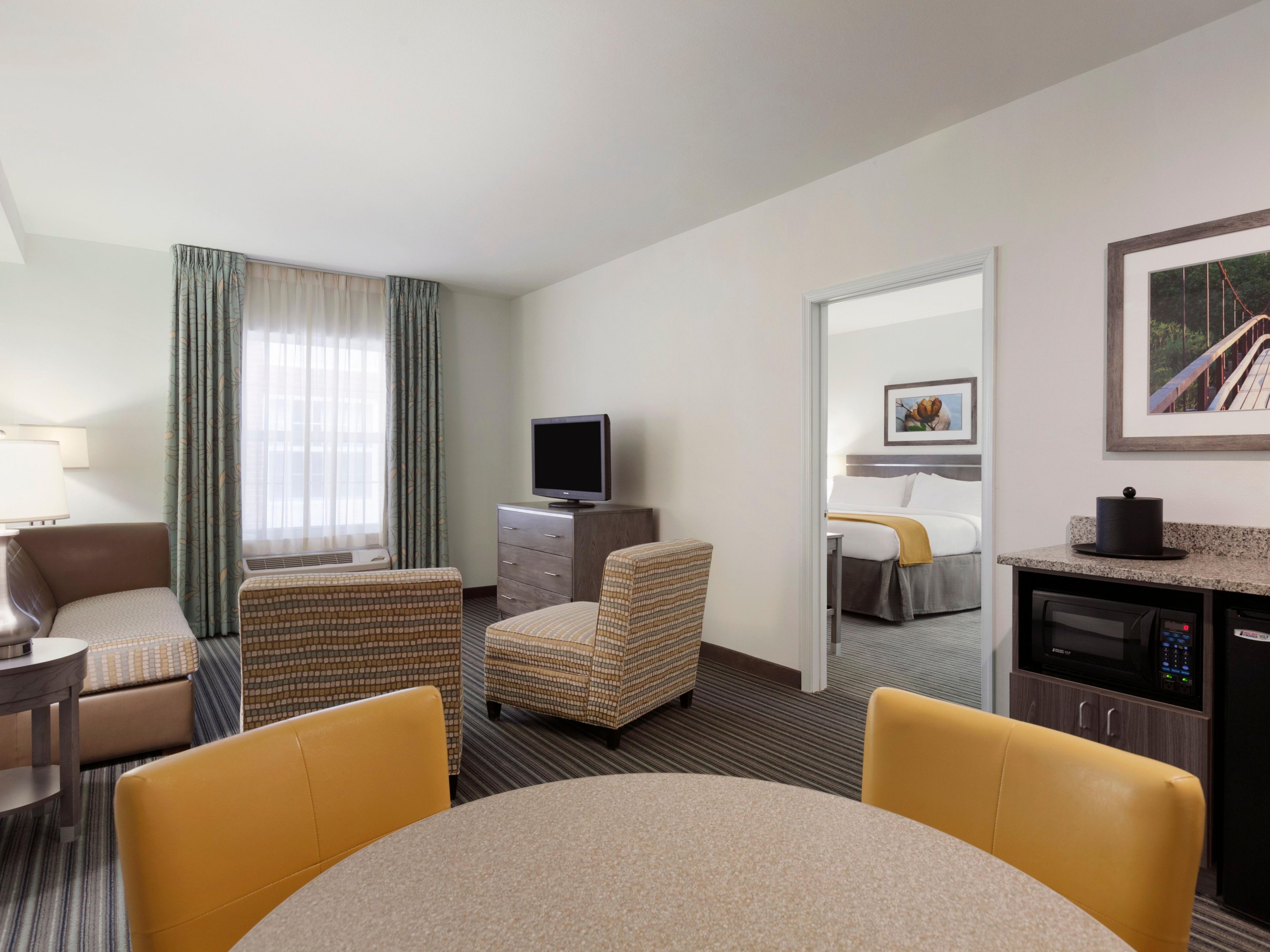 Our Suites & Executive Room Layouts are designed to make you feel at home with a separate living area with a sleeper sofa and a 37 inch HD TV with HBO a microwave and fridge add extra value and free high-speed wireless. 