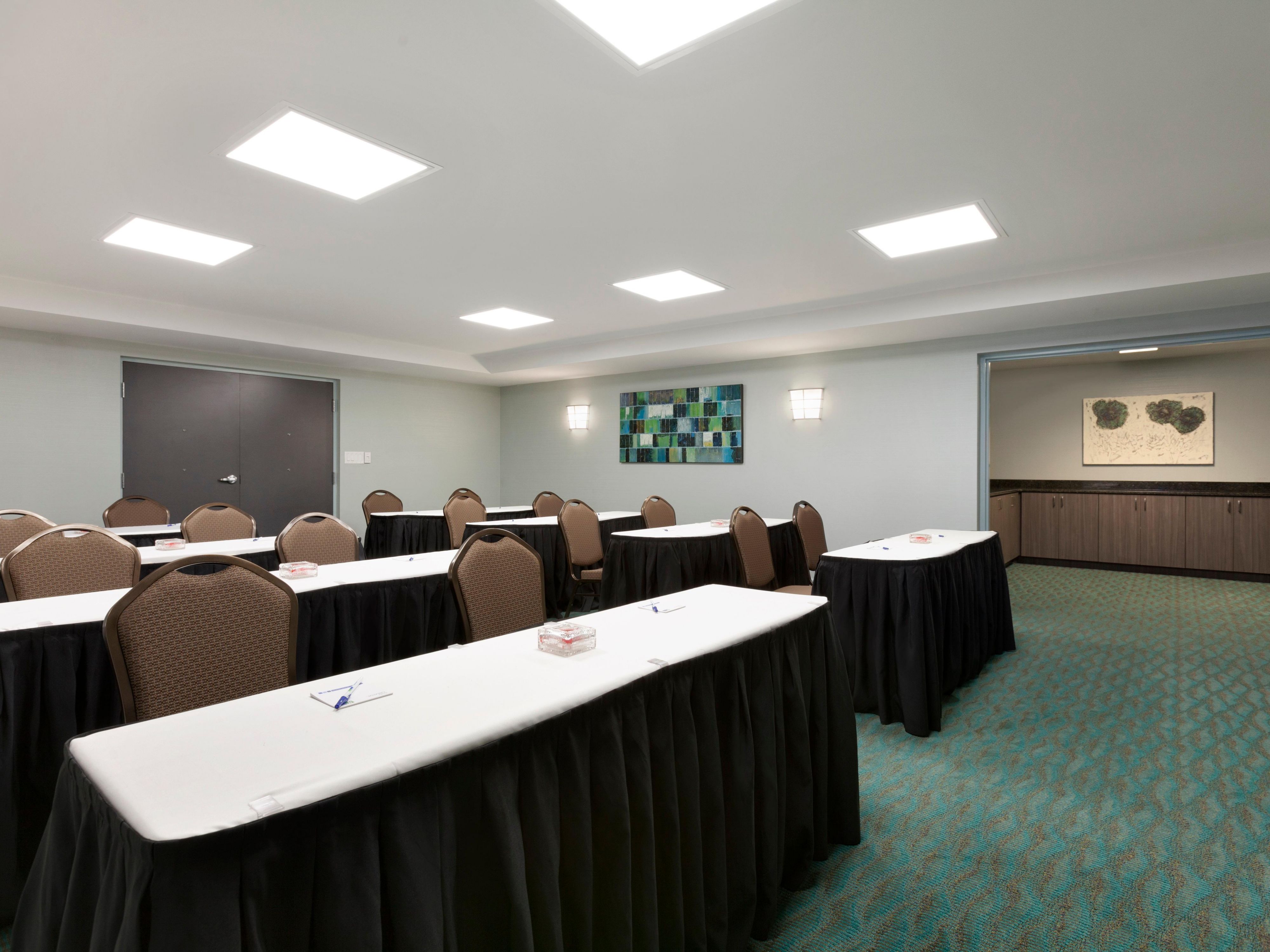 Great for small conference meetings, receptions and workshops.700 square feet. Outside catering permitted. Guest can use the U-shape credenza with granite counter top for buffet style serving.