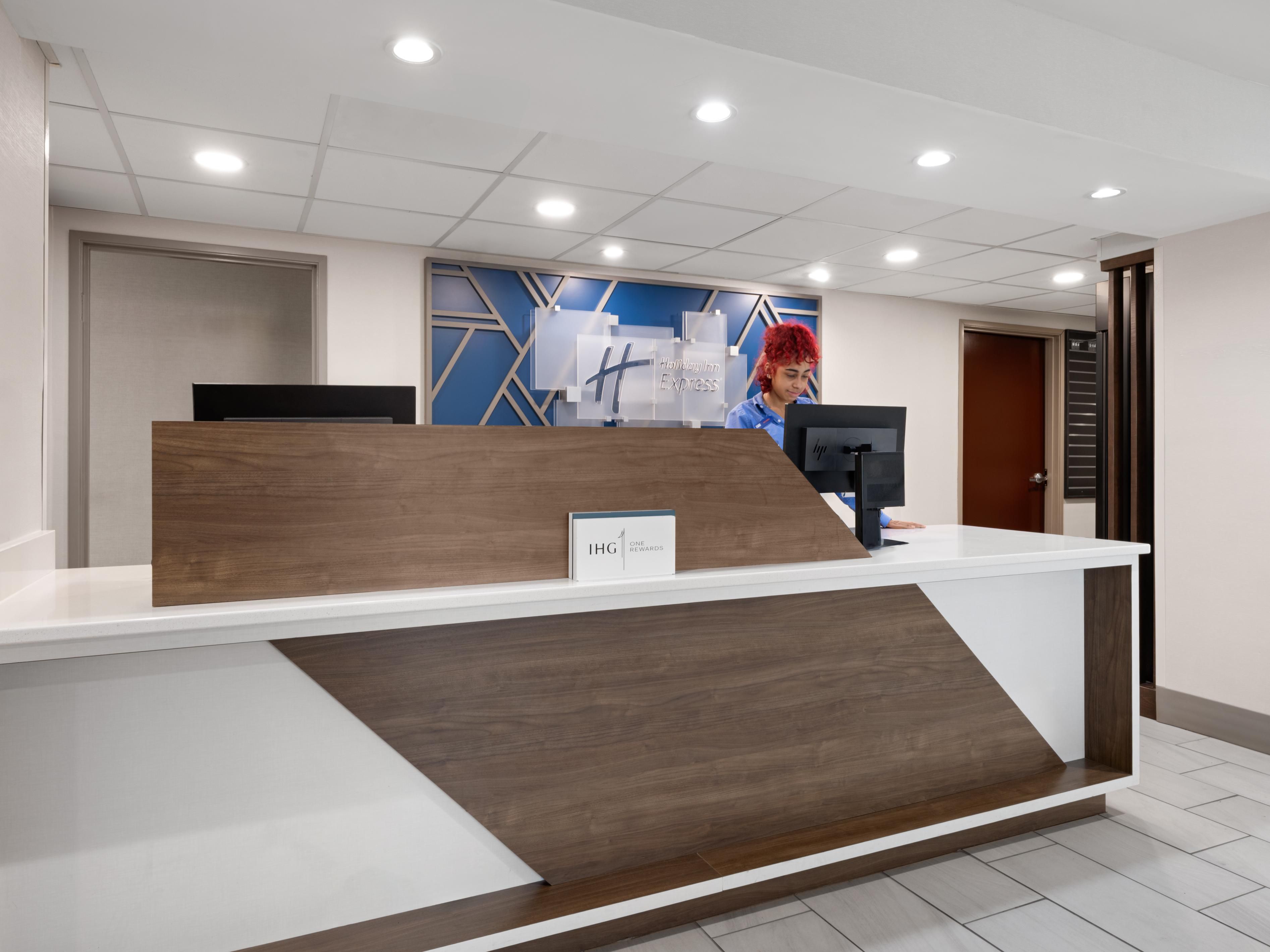Friendly front desk service welcoming guests in Winston-Salem area