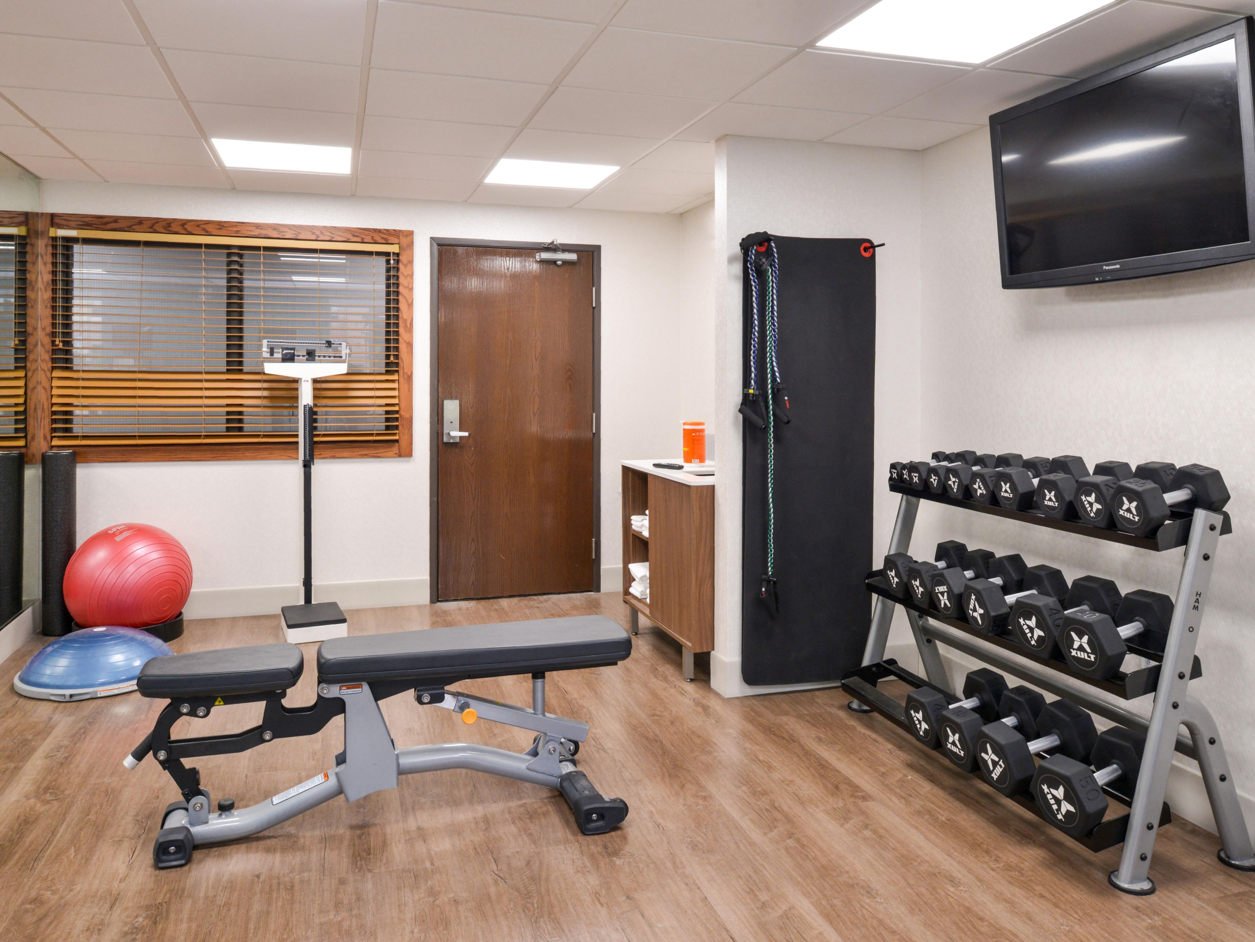 Modern Fitness Room with Extensive Options.