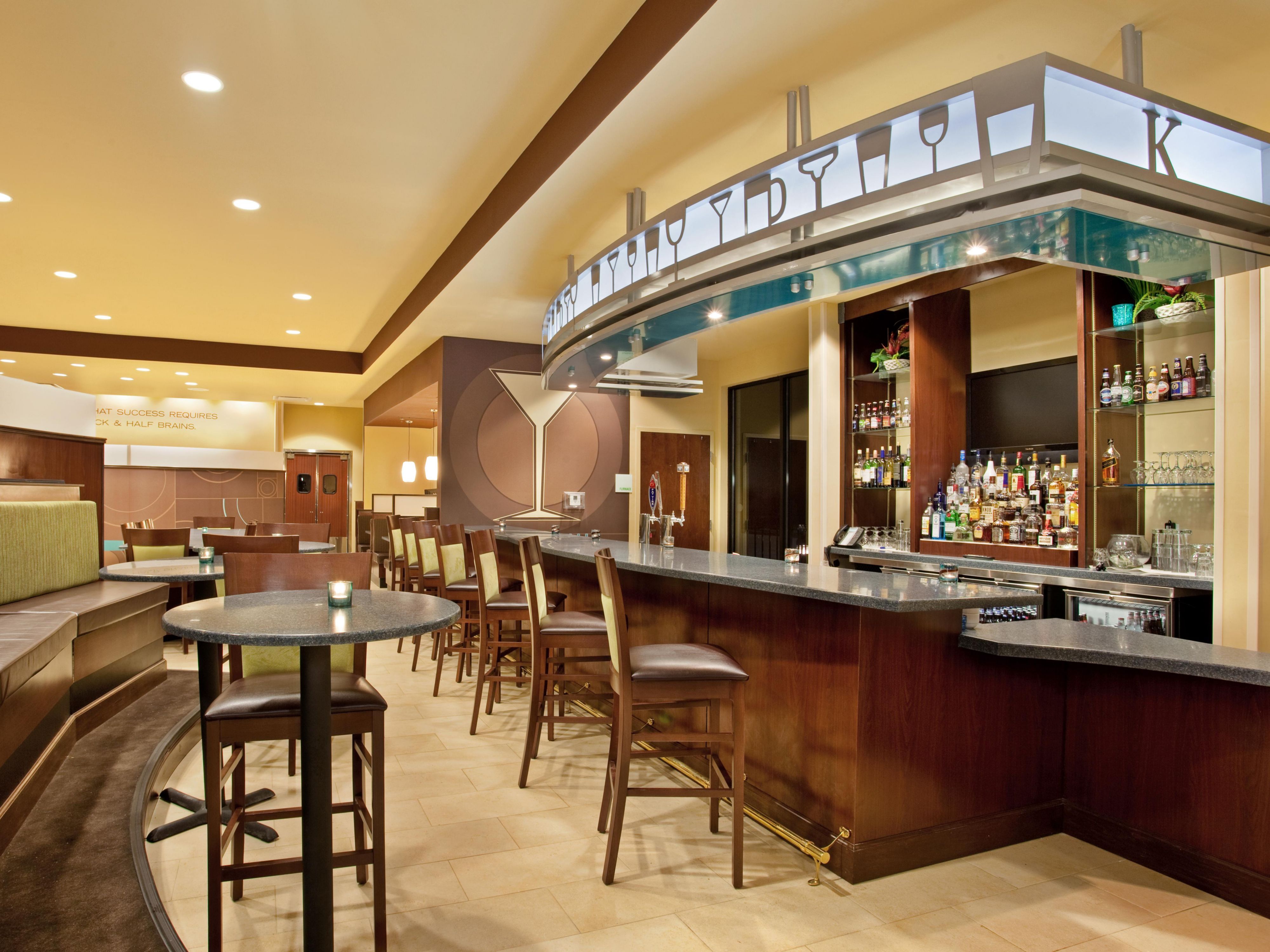 At our newly renovated hotel, we’re raising the bar—literally.
Join us Monday through Thursday from 5:30 PM to 7:30 PM in our full-service restaurant.
Enjoy one complimentary drink per guest per day, along with a rotating selection of free appetizers.
Unwind, connect, and make the most of your stay in a space designed for comfort and good times.