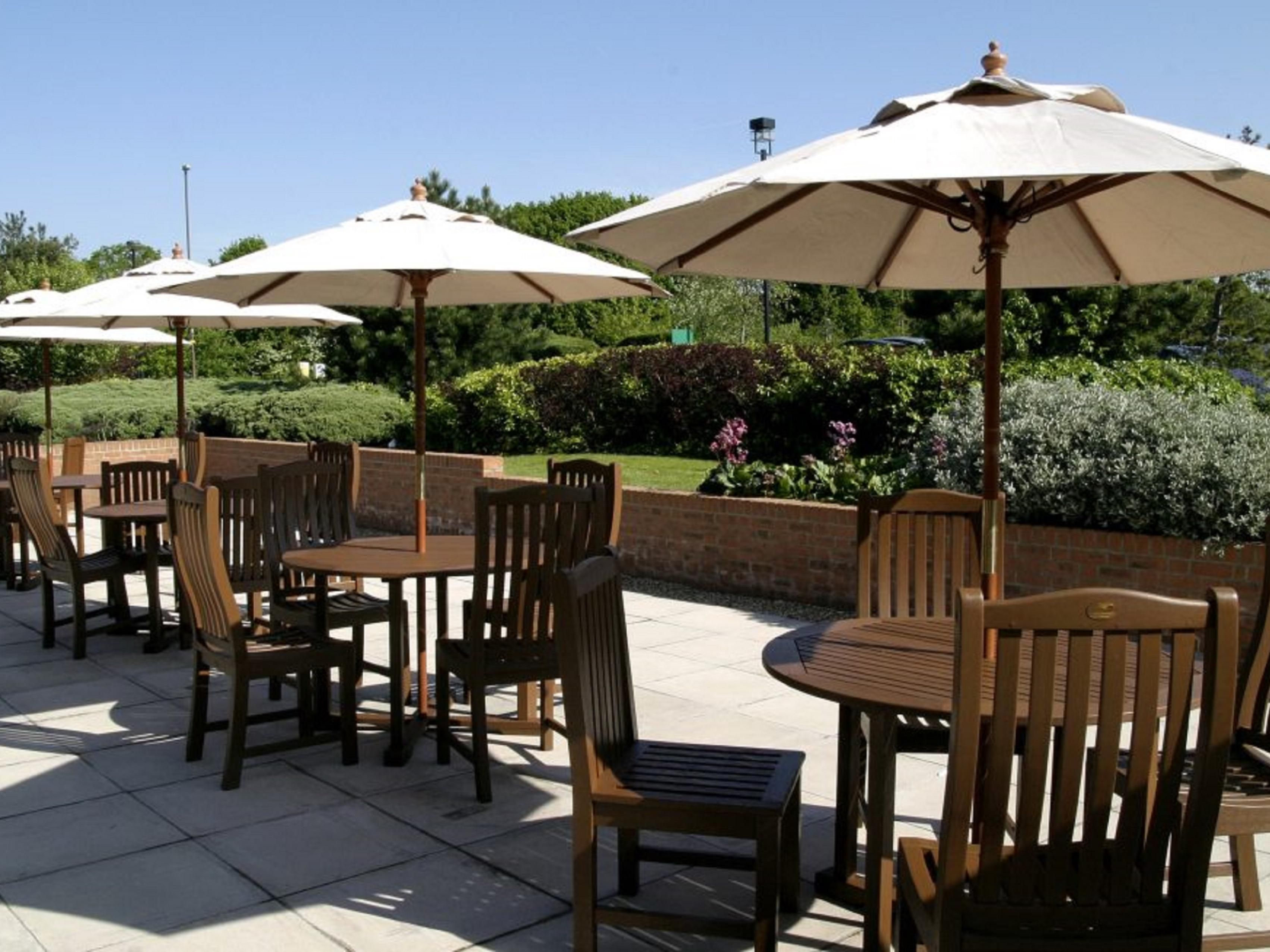 Enjoy a cold refreshment in our outdoor seating area, perfect for the warmer months.