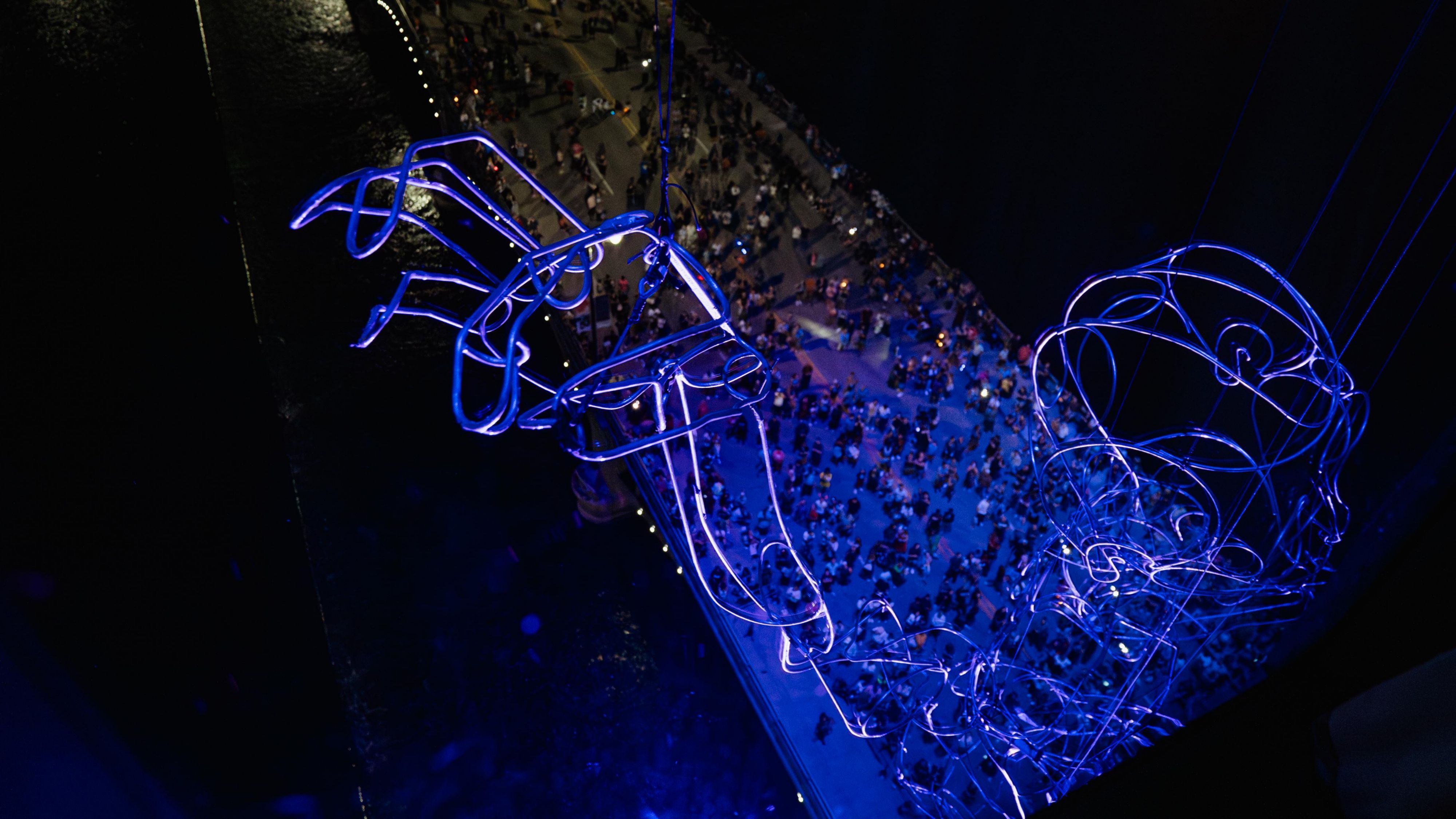 Giant puppet at ArtPrize with a crowd underneath