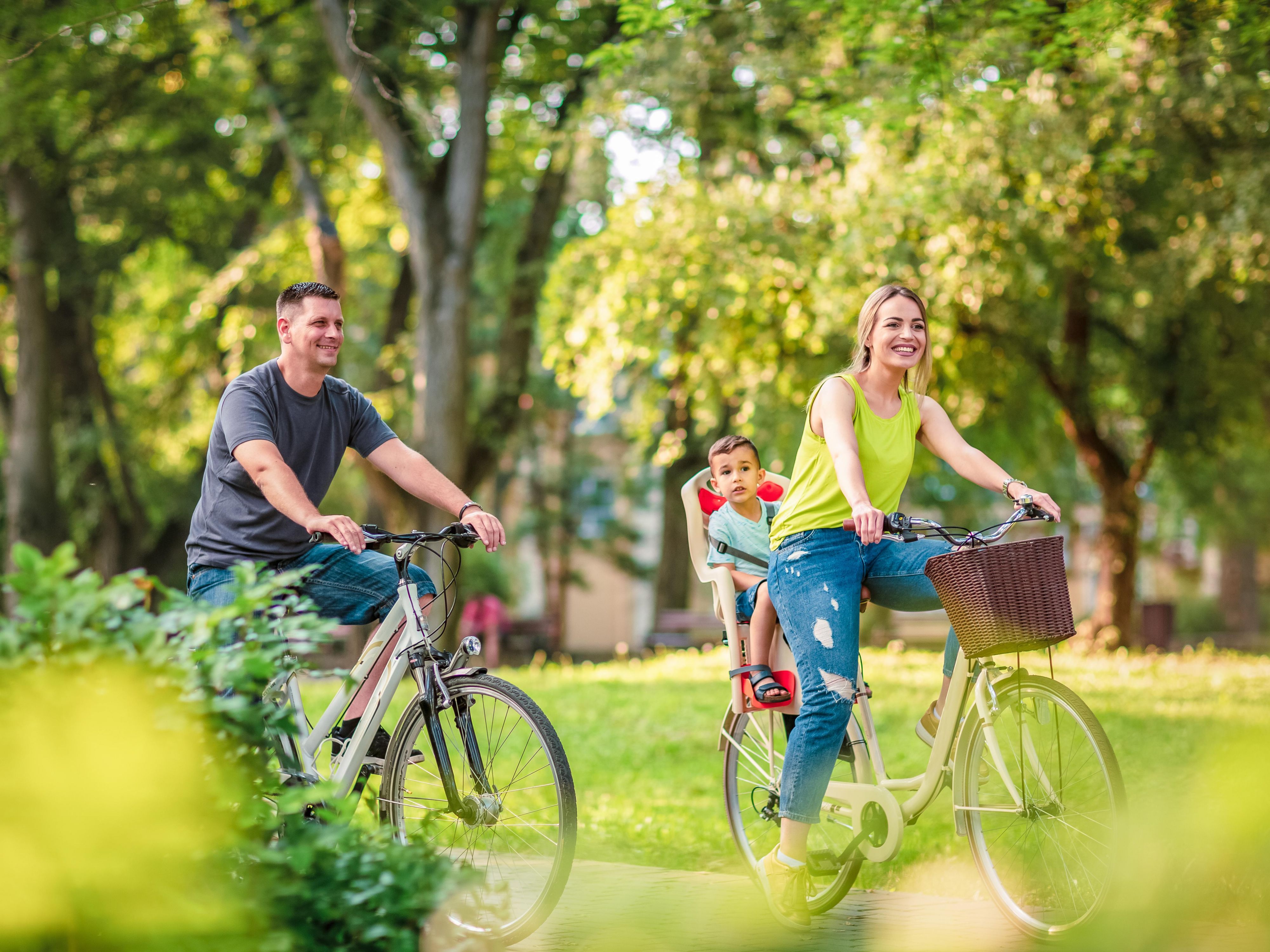 Family riding bikes