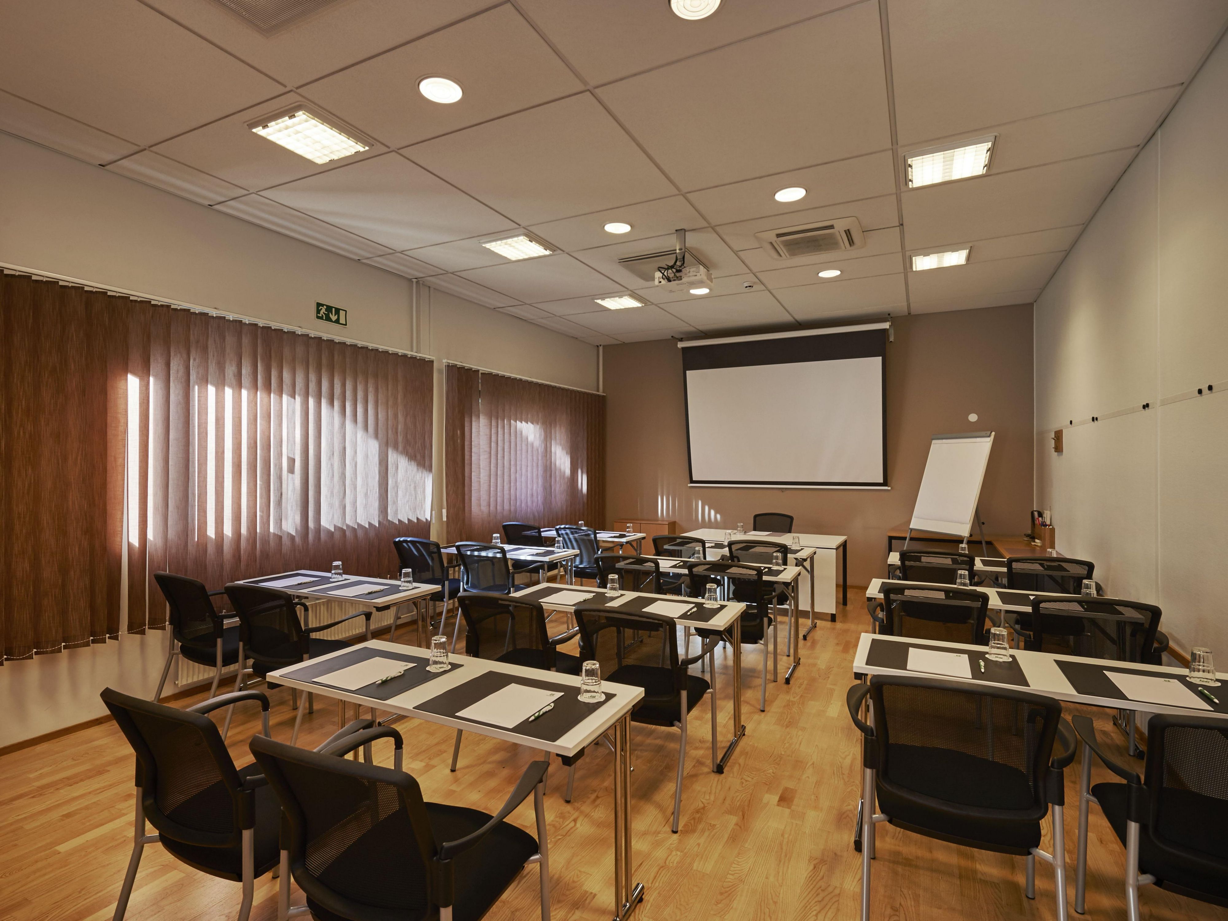 Our location near the Helsinki-Vantaa Airport and Ring Road III makes the hotel an easy to get meeting point. Whether you arrive with us by airplane or car, it is easy to reach our hotel.
Our hotel’s seven meeting rooms work well for groups of 2 to 26 people. All our meeting rooms have a complimentary internet access. Contact us for more details.