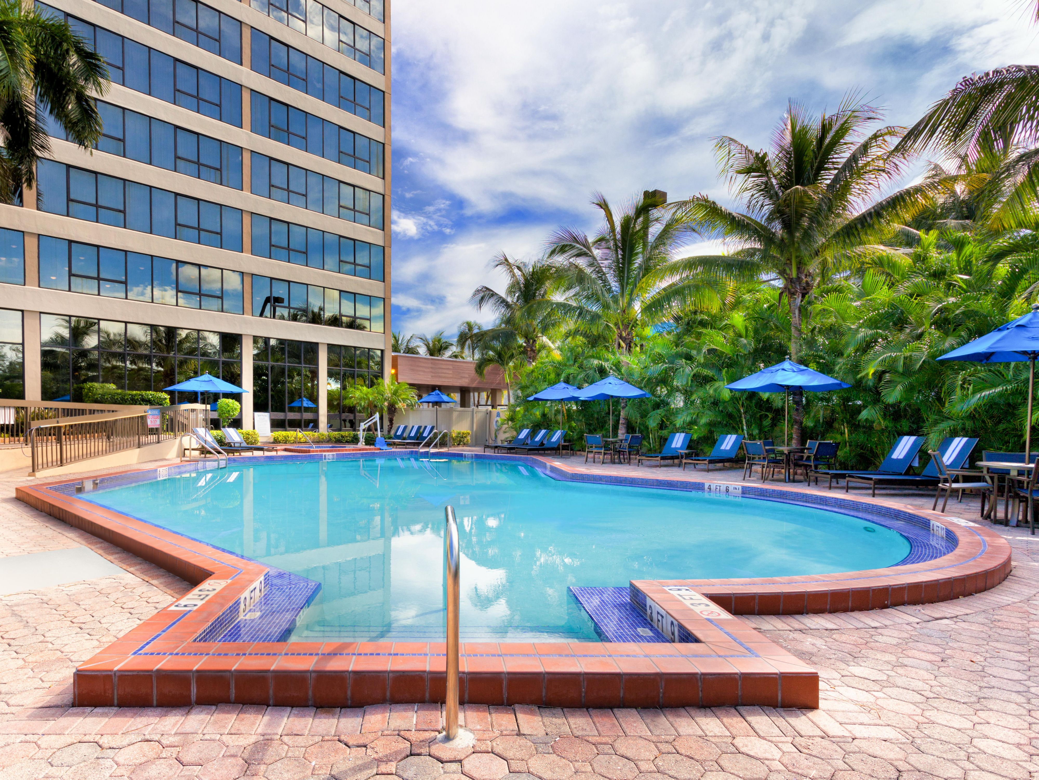 Take a refreshing dip in our sparkling outdoor pool—your perfect escape under the Miami sun! Surrounded by palm trees and comfy lounge chairs, it’s a great spot to relax, catch some rays, or unwind after a busy day. Whether you're here to swim or just soak up the tropical vibes, the poolside is always a guest favorite. 