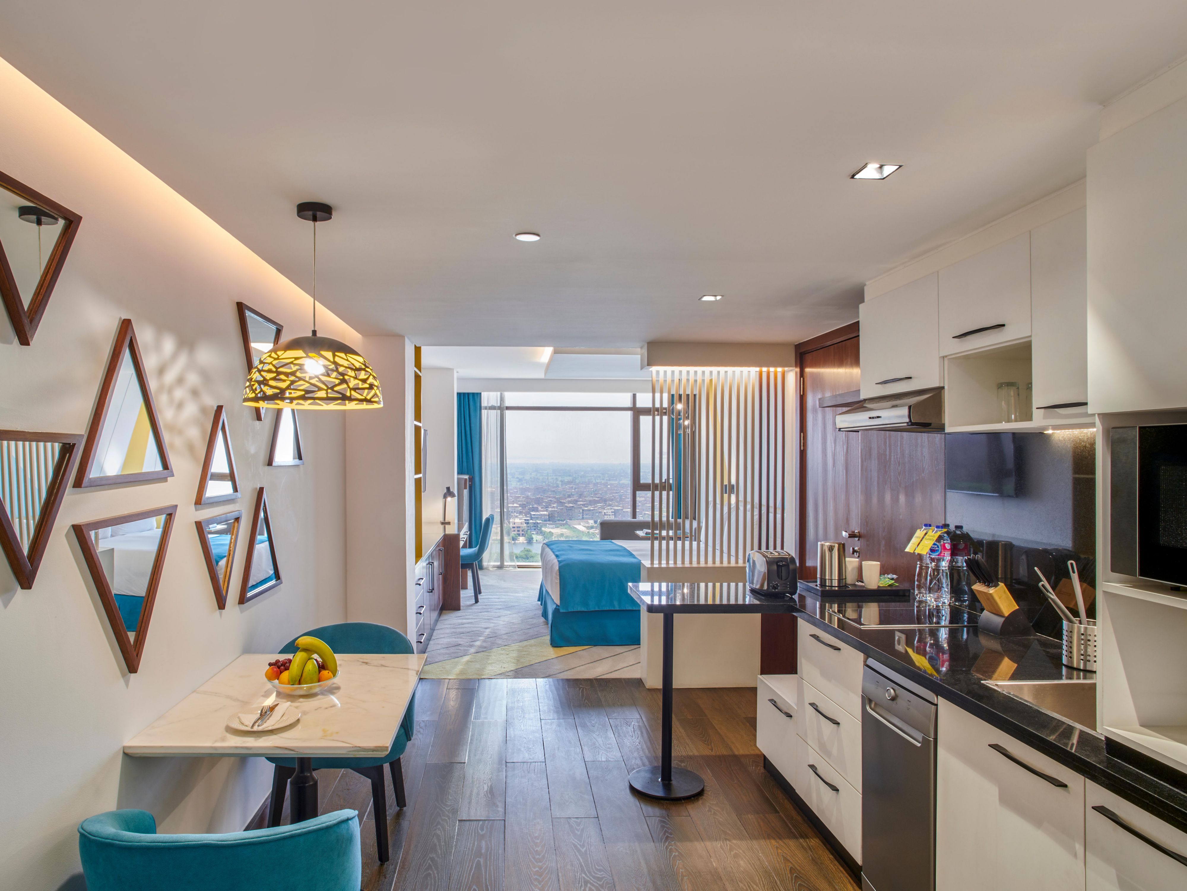 Indulge in comfort and convenience with a suite boasting a kitchen and laundry room. Prepare meals anytime and enjoy onsite laundry facilities. Perfect for extended stays or family vacations, your suite becomes a cozy home-away-from-home. Elevate your travel experience today at Holiday Inn & Suites Cairo Maadi!