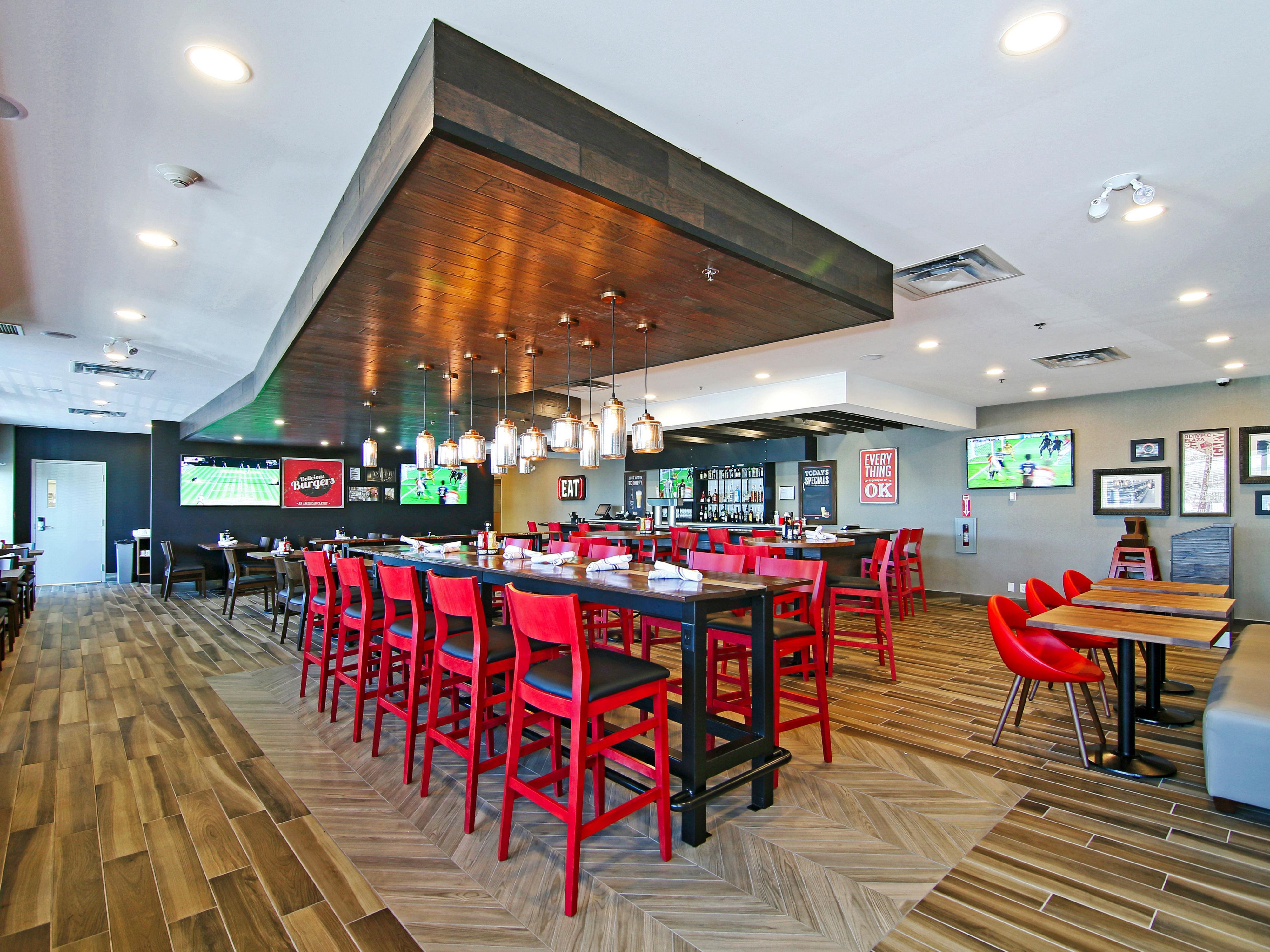 Craft your gourmet burger experience with over 4,320 combinations, featuring 8 local craft beers on tap.