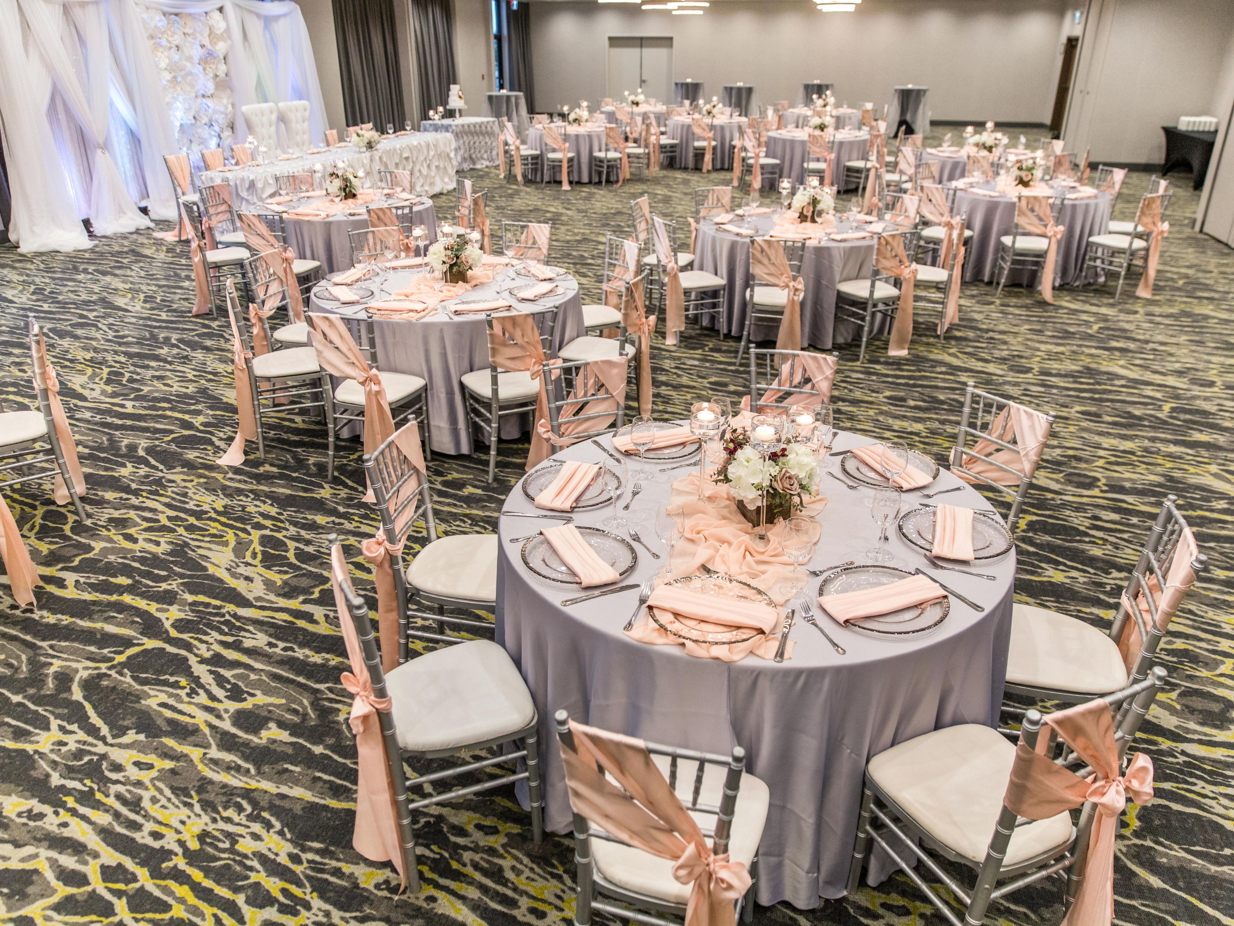 We showcase a modern ballroom specializing in providing a unique setting for your upcoming wedding or special event. Our hotel venue offers a 5200 square foot ballroom with natural light and free of obstructions that can accommodate weddings of up to 275 guests.

Call our Catering and Sales Team today! 

Call 403-475-8561