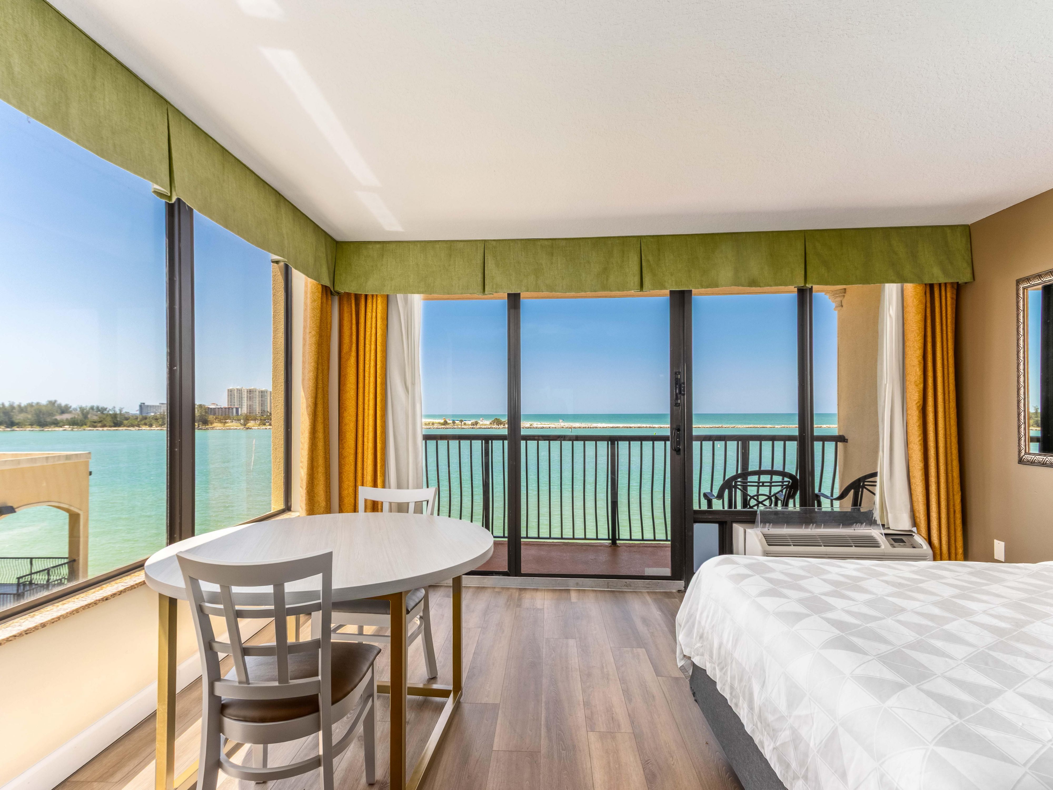 Queen bed suite with a view of the gulf