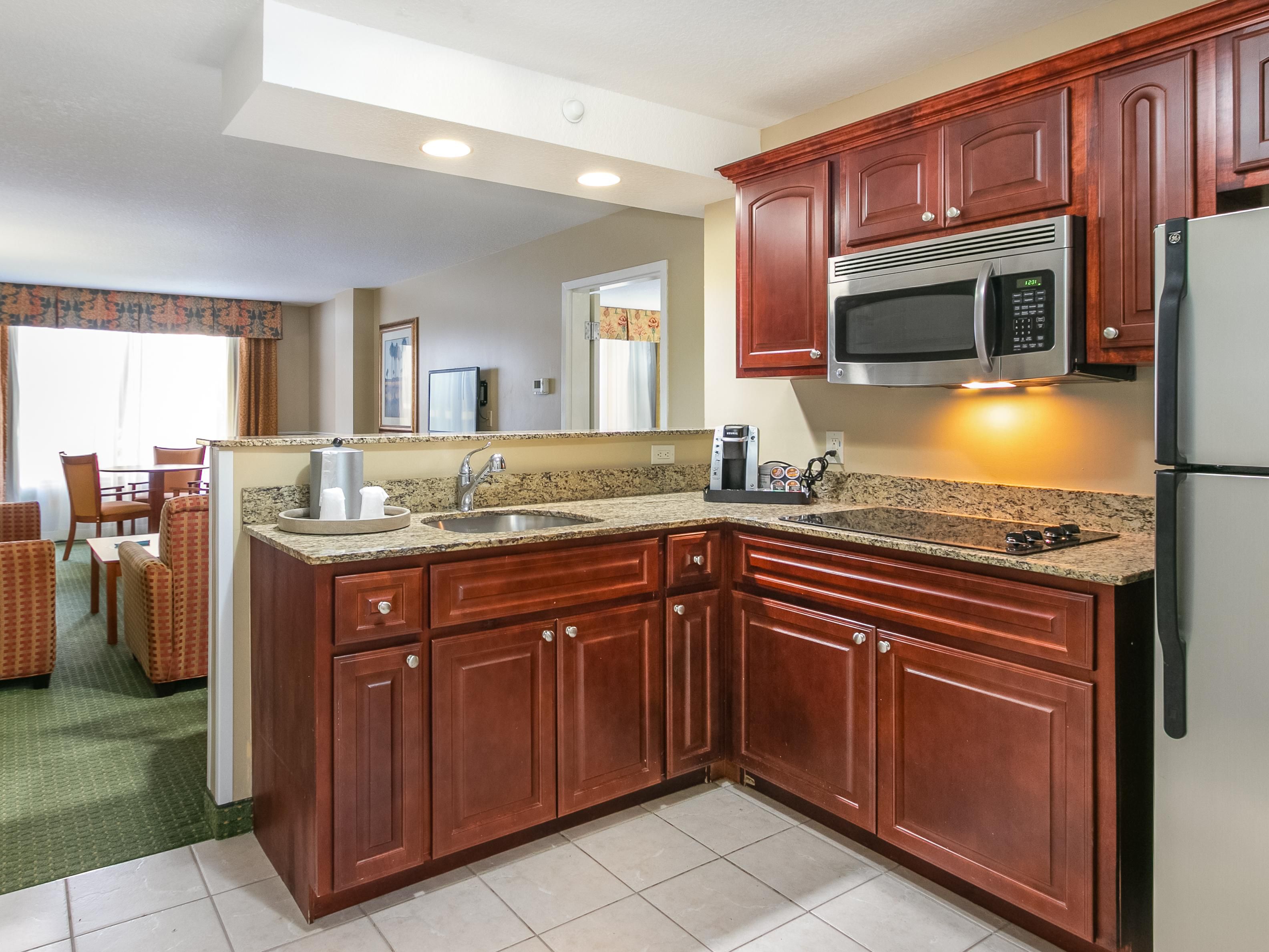 Our suites feature full kitchens with refrigerators, microwaves and stovetops