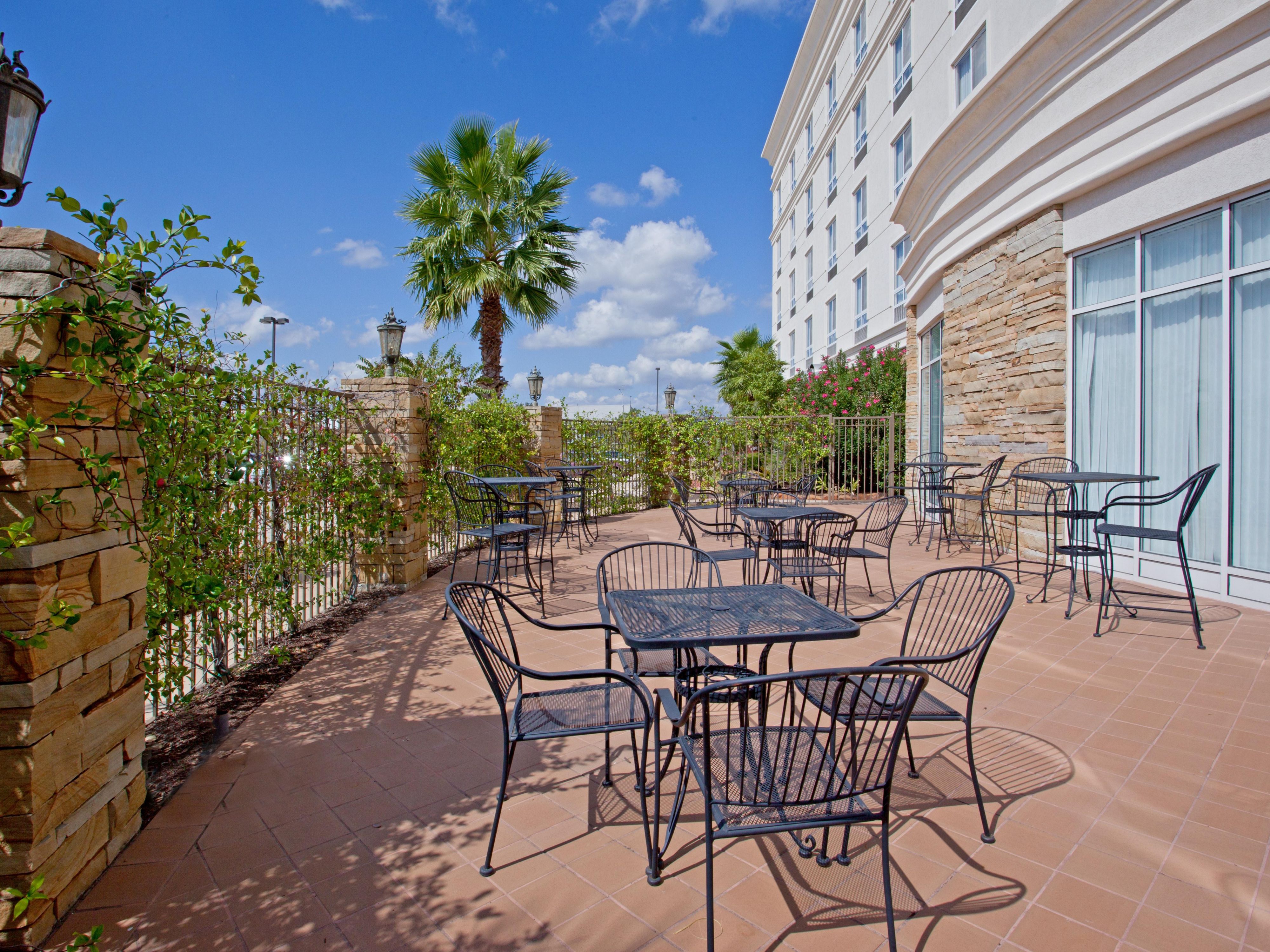 Unwind in our charming outdoor patio area with scenic views
