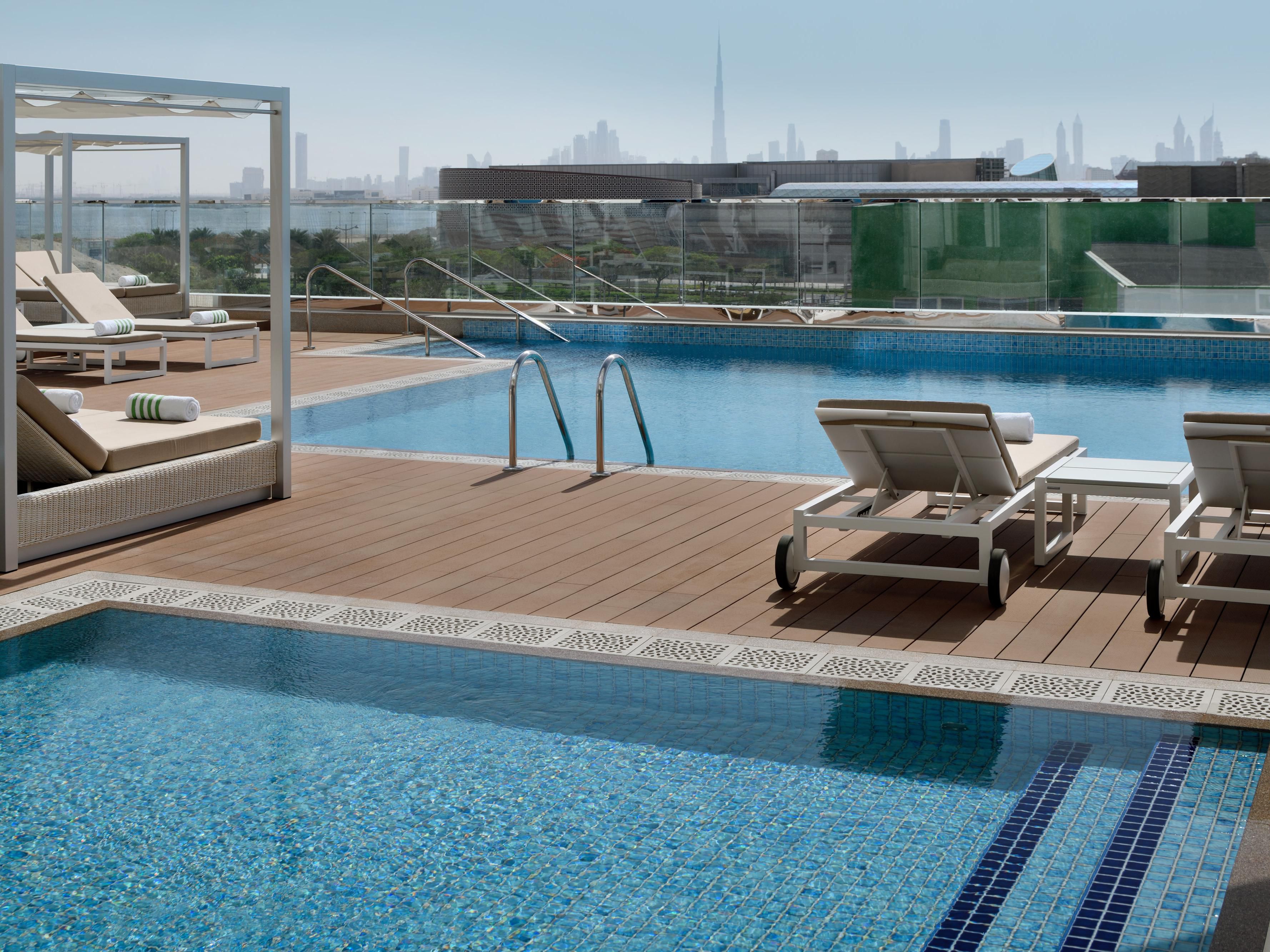 Relax on the pool side with refreshing drinks from the pool bar