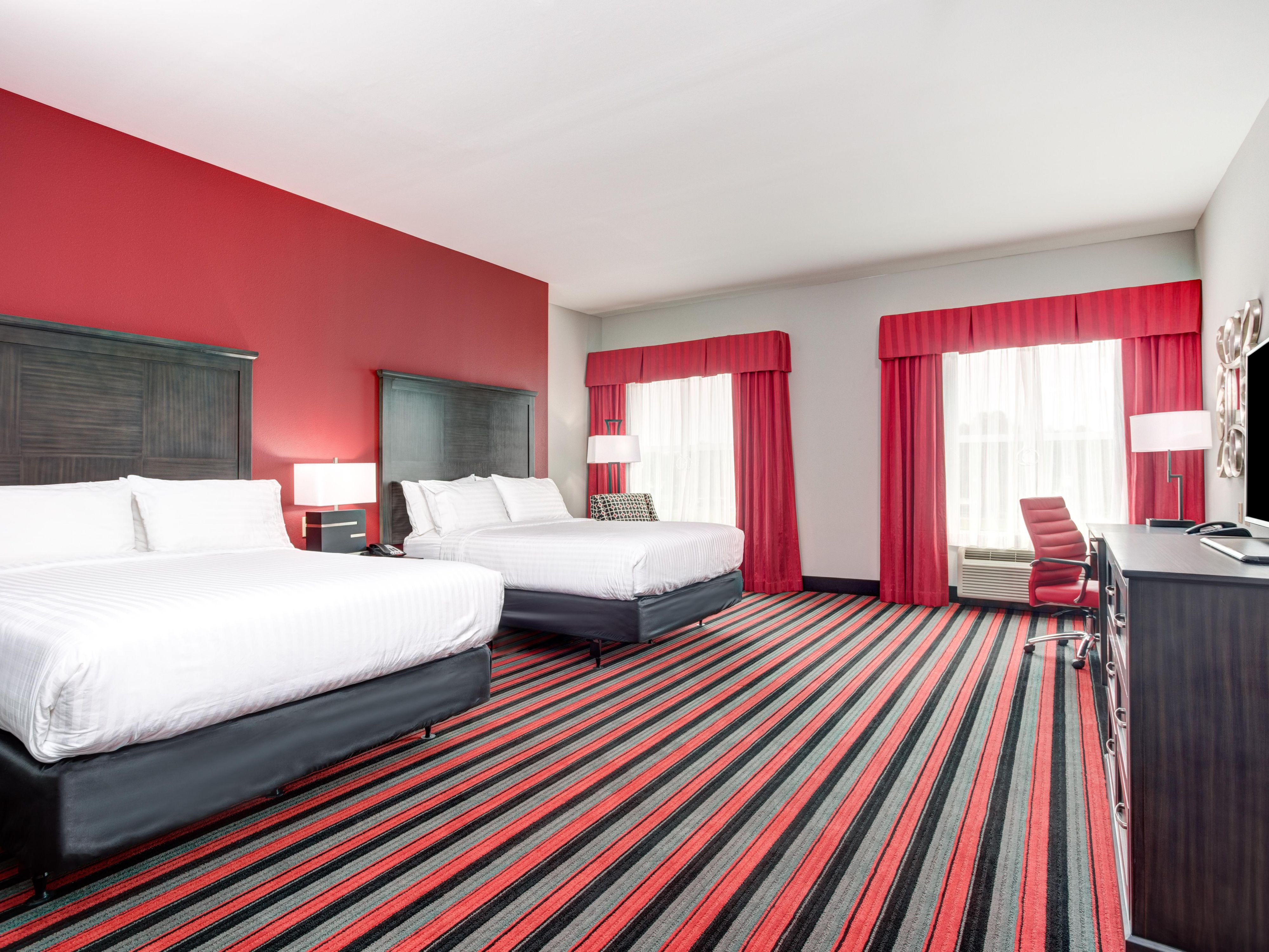 Settle in to spacious guestrooms designed for work and relaxation. Stay connected with free Wi-Fi, catch a movie on a 42-inch flat-screen TV, or get cozy in triple-sheeted bedding. With a mini fridge, coffee and tea supplies, an ergonomic workstation, and a seating area, our Lafayette hotel rooms are made to keep you feeling at home day and night.