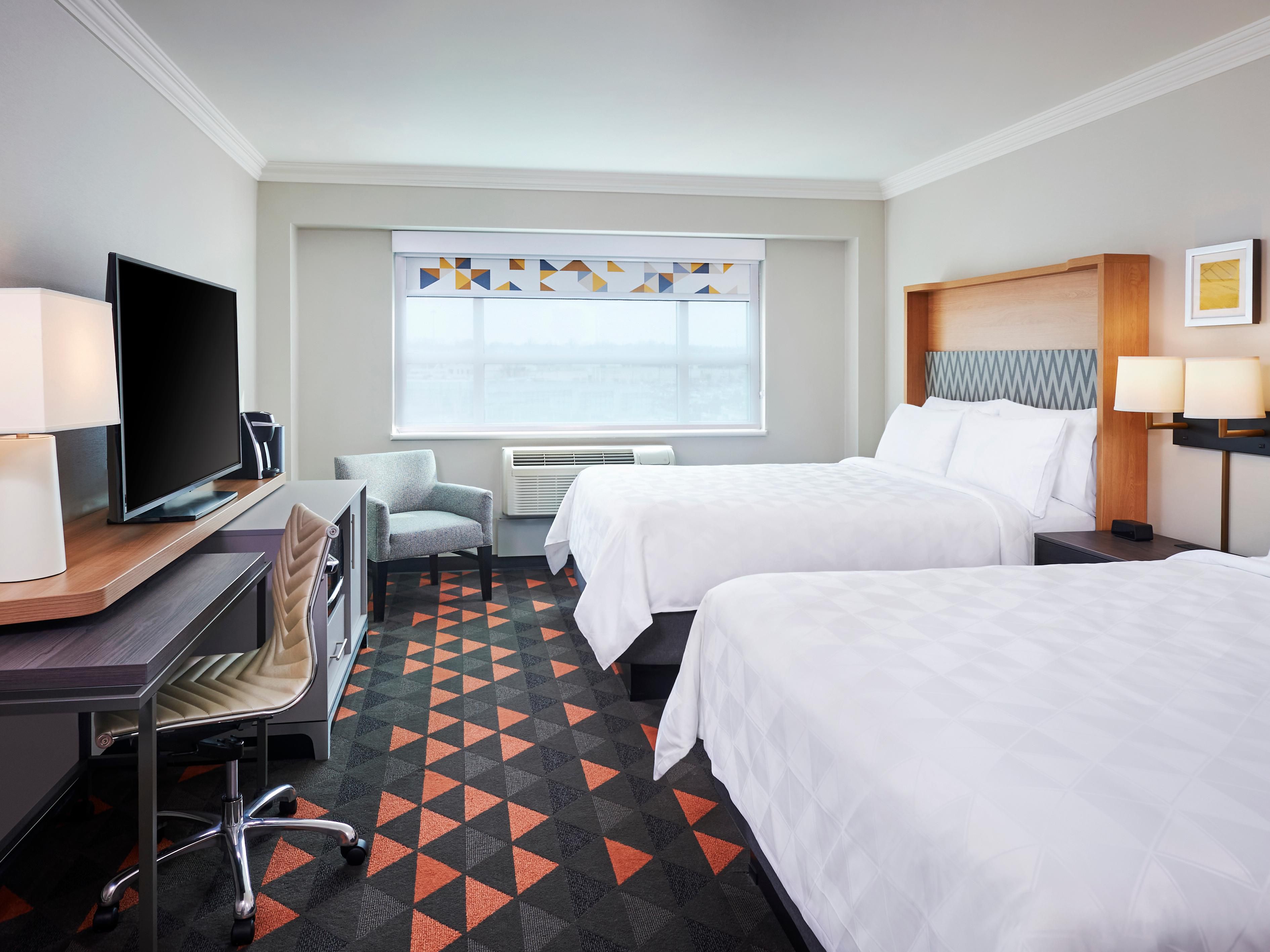 Our comfortable guest rooms are newly renovated. We've taken care of every detail, from fresh white linens and ergonomic chairs to a spacious walk-in shower and thoughtfully designed working nooks. With modern décor that's bright, cheerful, and inviting, our hotel is ready to welcome you in.  