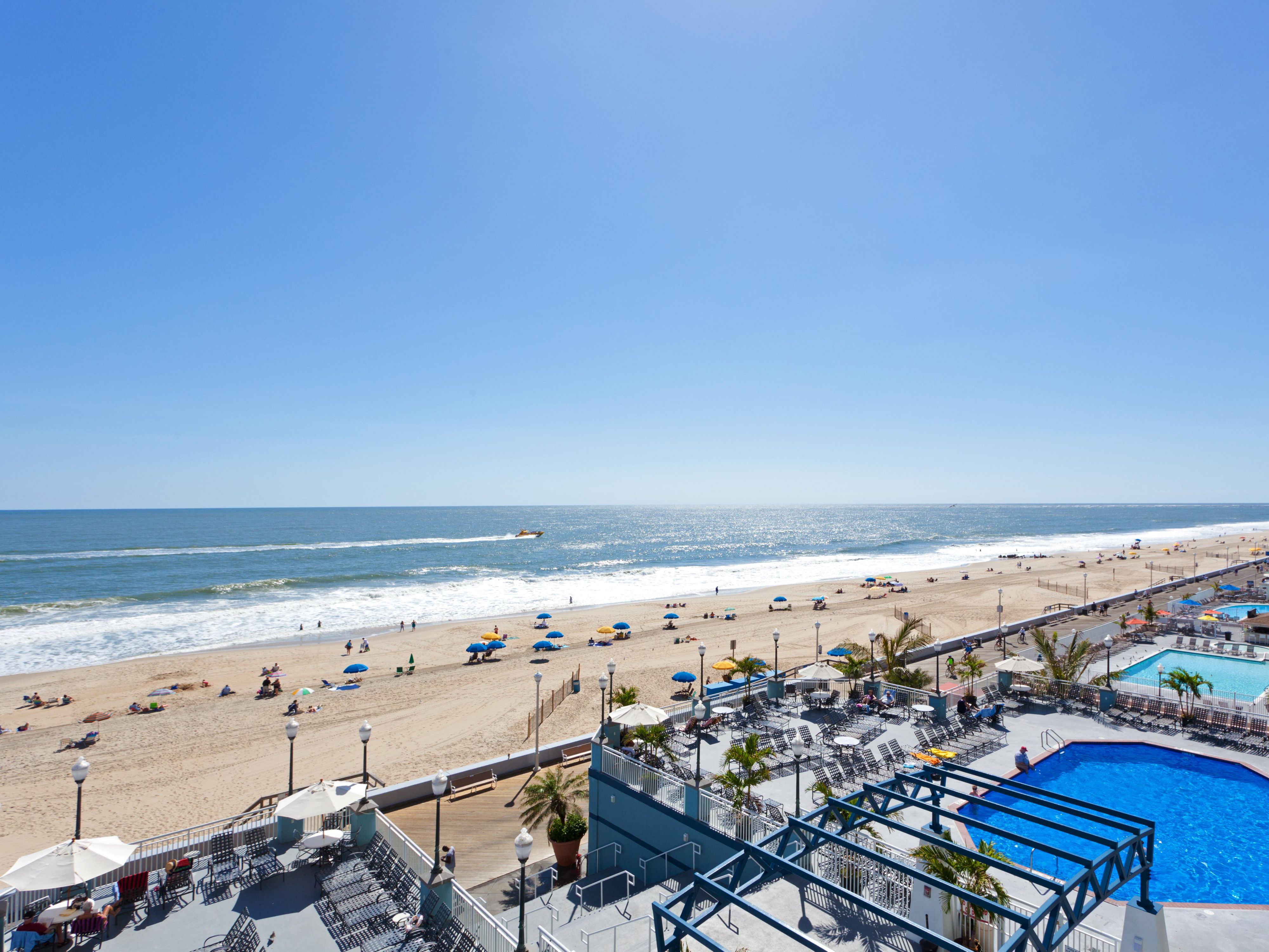 Experience the beauty of Ocean City from our prime beachfront location on the Boardwalk. Step out of our hotel onto the soft sands and into the soothing waves. Our hotel is the perfect spot for beach lovers looking to soak up the sun and sea with the convenience of beach access just steps from your room.