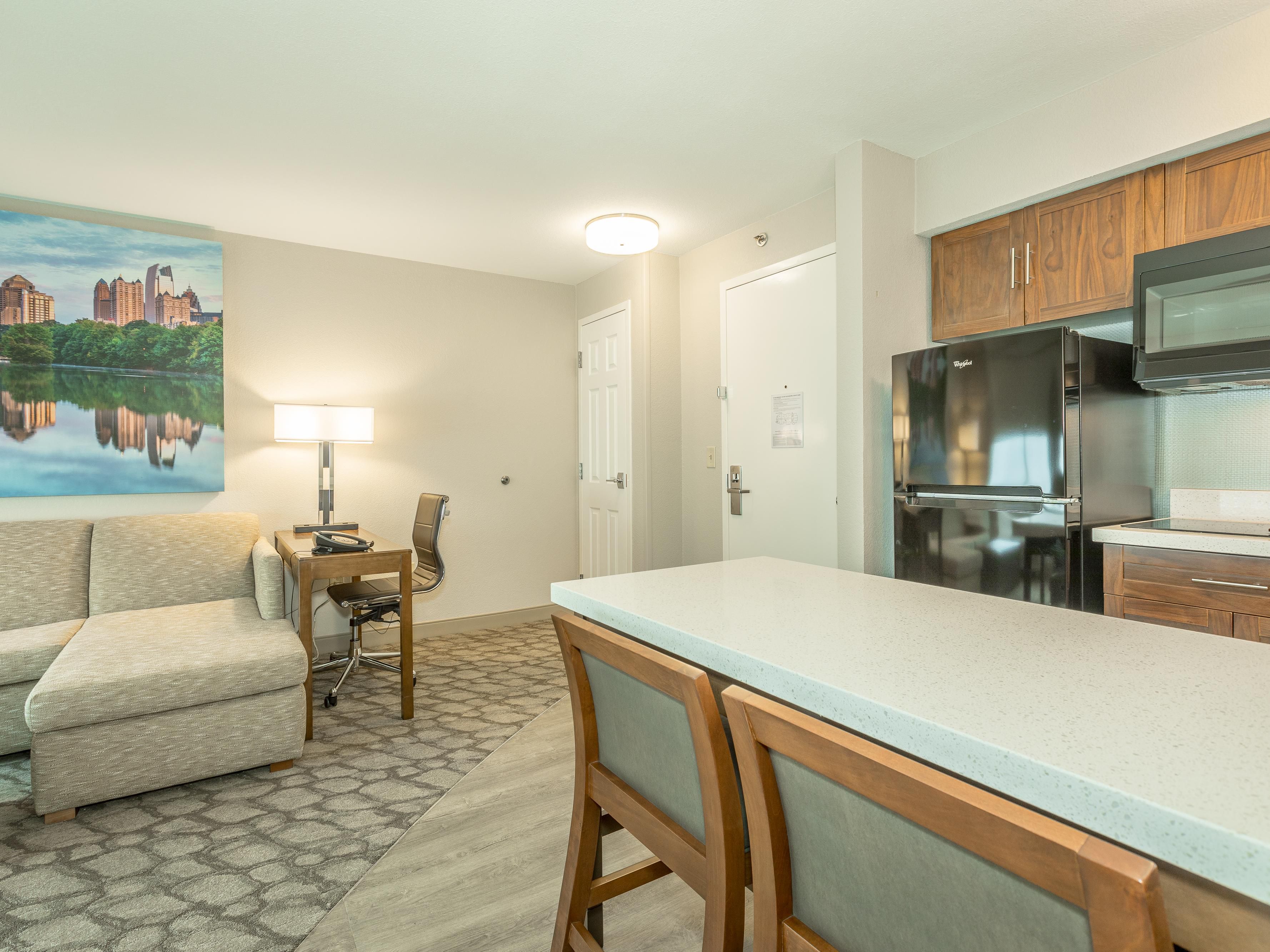 Our Two Room Suites are fully stocked with amenities for every day living and perfect for a mini get a away or convenient alternative for extended stay or apartment living. Includes living room lounge area with television and separate sleeping quarters. 