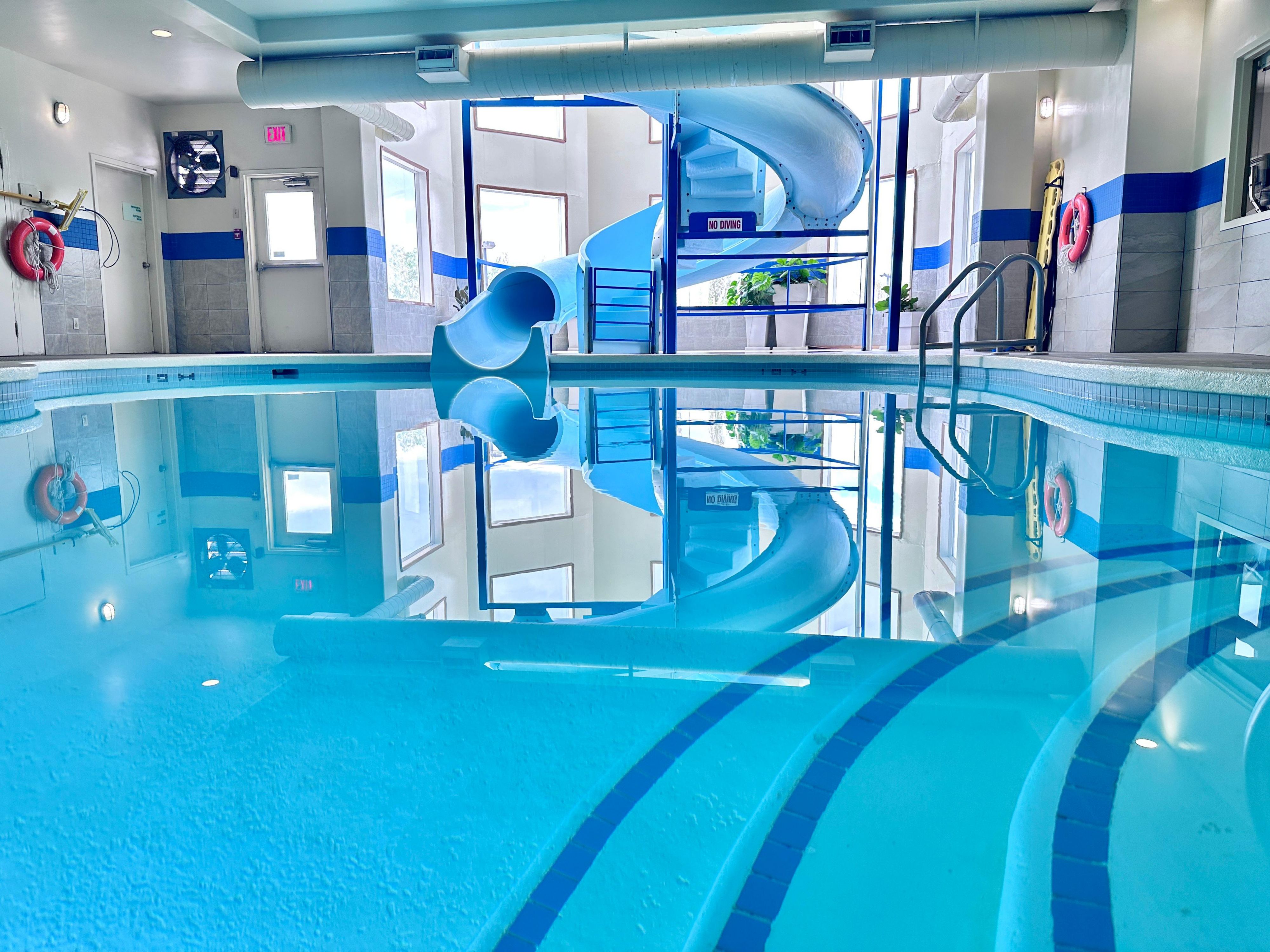In a town with the kids? Swim with the kids in our indoor pool with a waterslide and hot tub. The pool is open from 9am until 10pm daily.