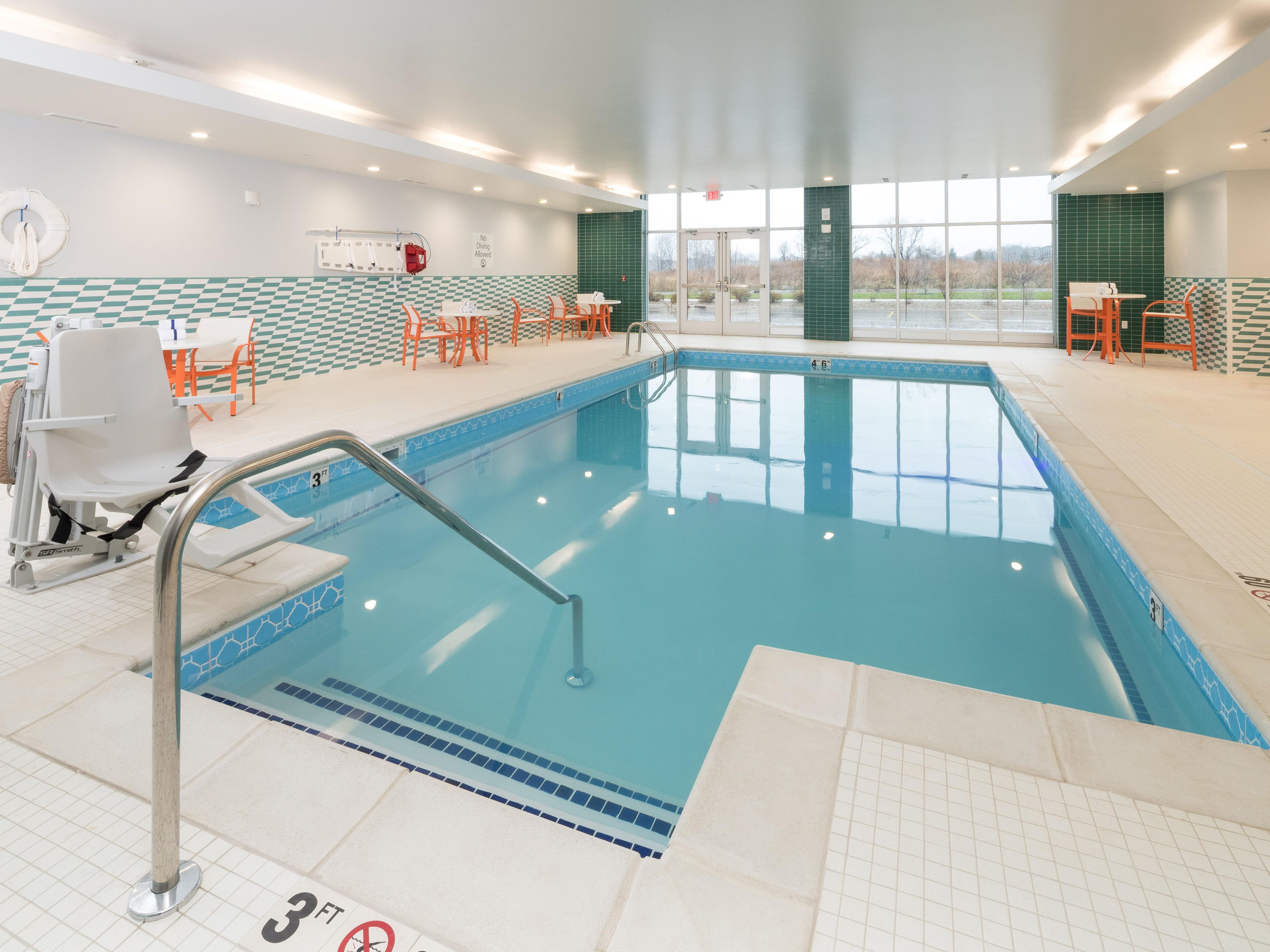 Bring the kids down to our large indoor pool with a three foot shallow end perfect for splashing around. Dive into the deep end and swim a few laps or cool off after a workout in the gym. Relax in our poolside chairs and unwind with your favorite streaming music.