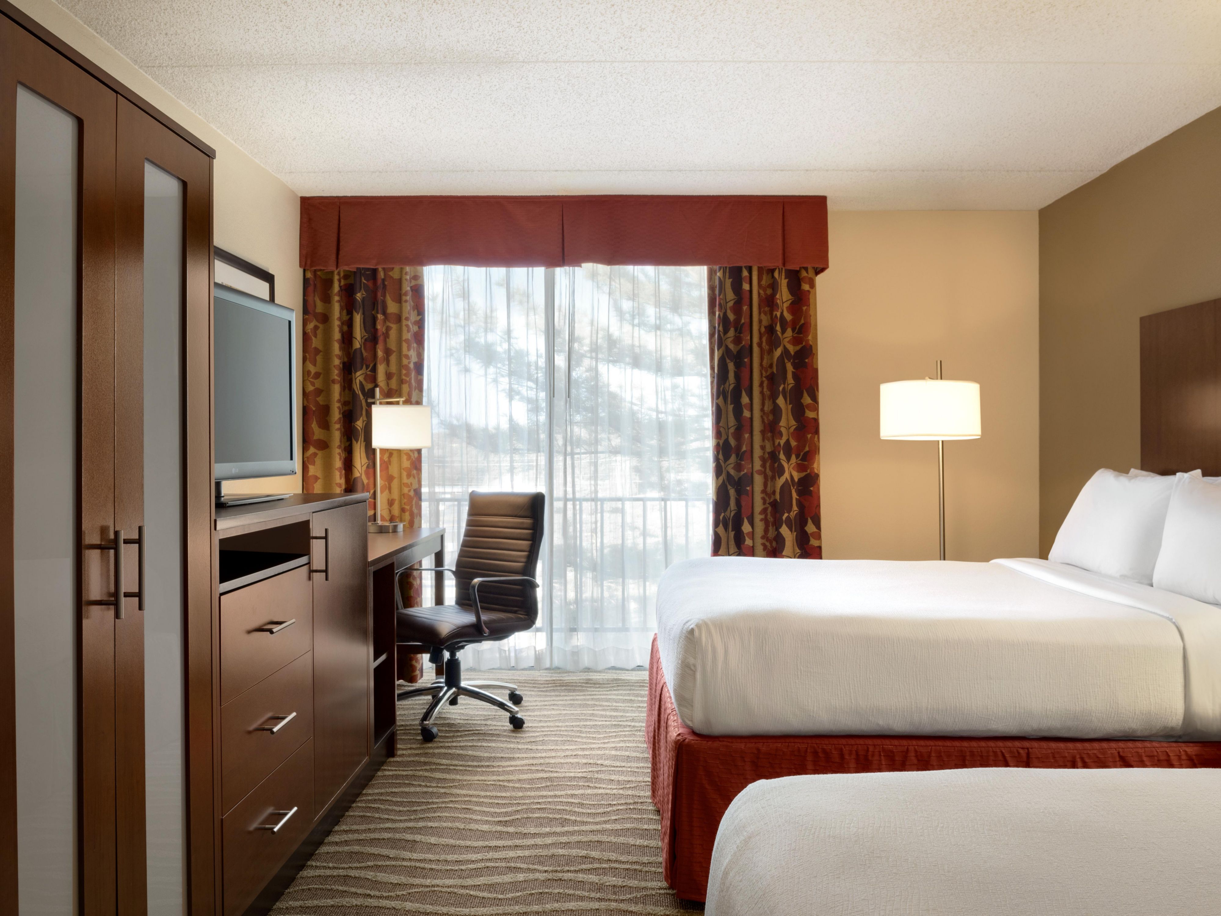 Guests love our unparalleled amenities that turn an average stay into a stress-free experience. Each guest room includes complimentary Wi-Fi, refrigerator, microwave, Keurig coffee maker, and comfortable bedding. Need more space? 
Upgrade to one of our spacious suites!
