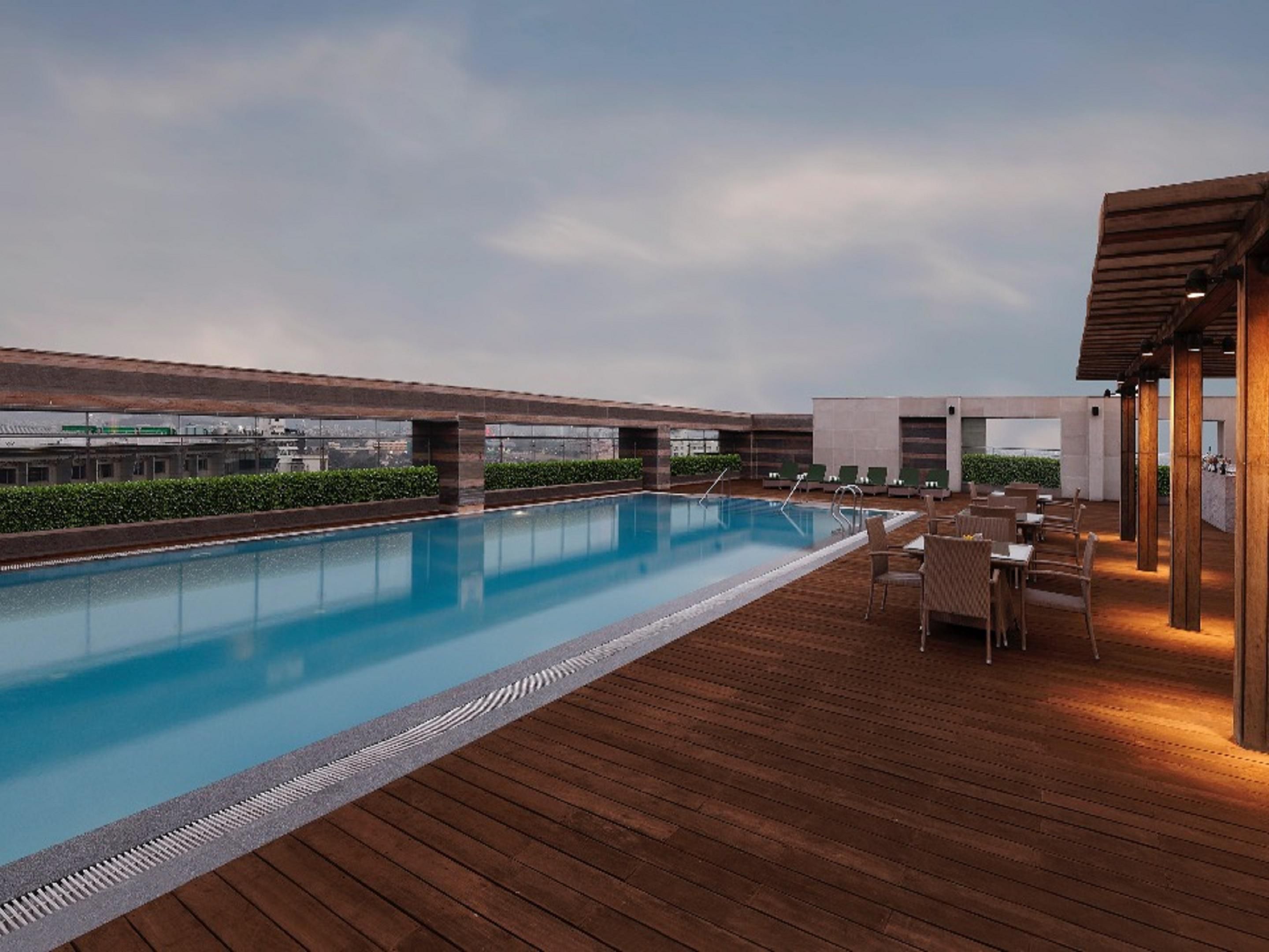 A leisurely outdoor swimming pool with a spectacular view of the city. Enjoy and relax at our refreshing recreational facilities with your loved ones.