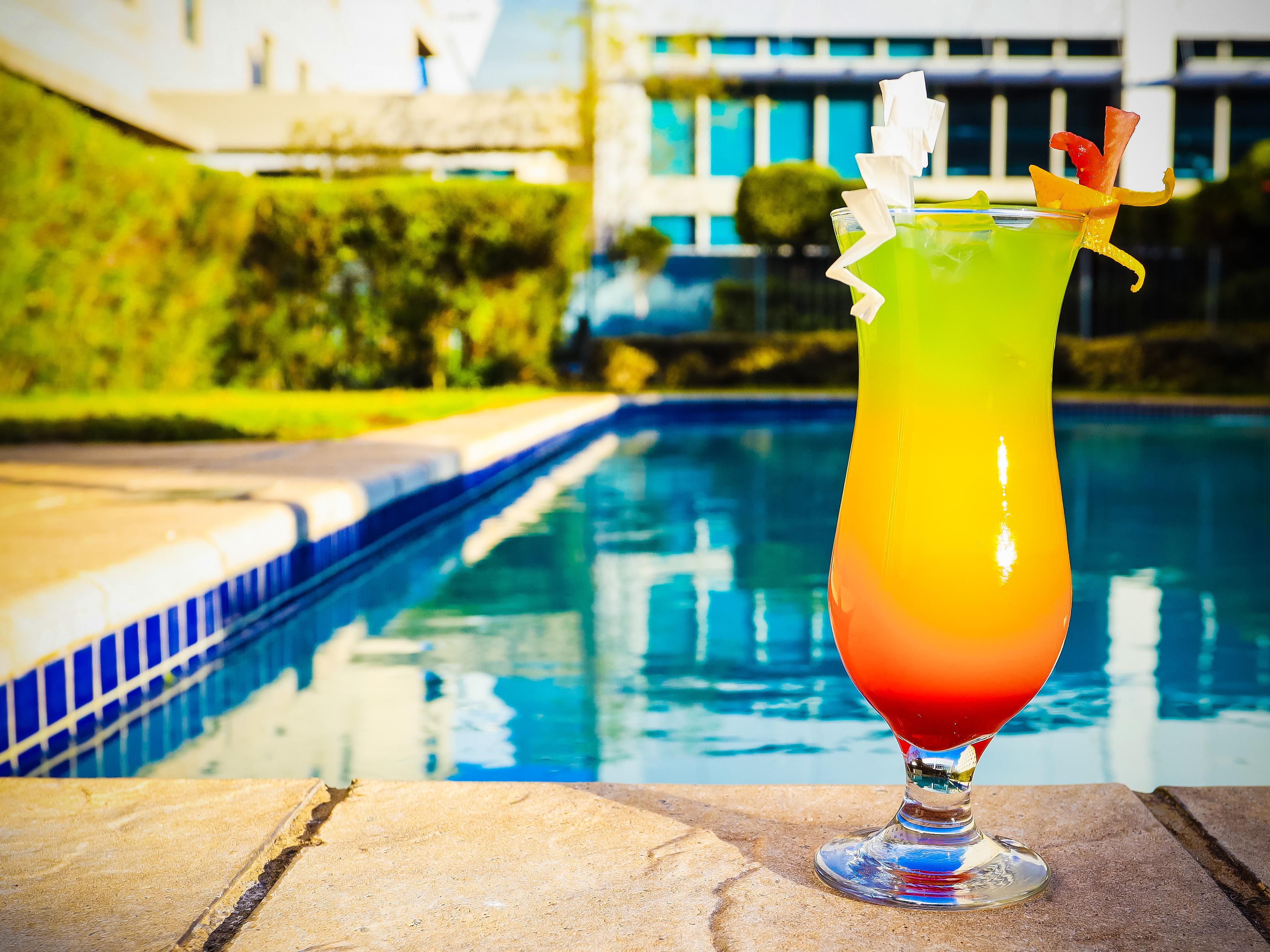 Colourful drinks at our crisp pool