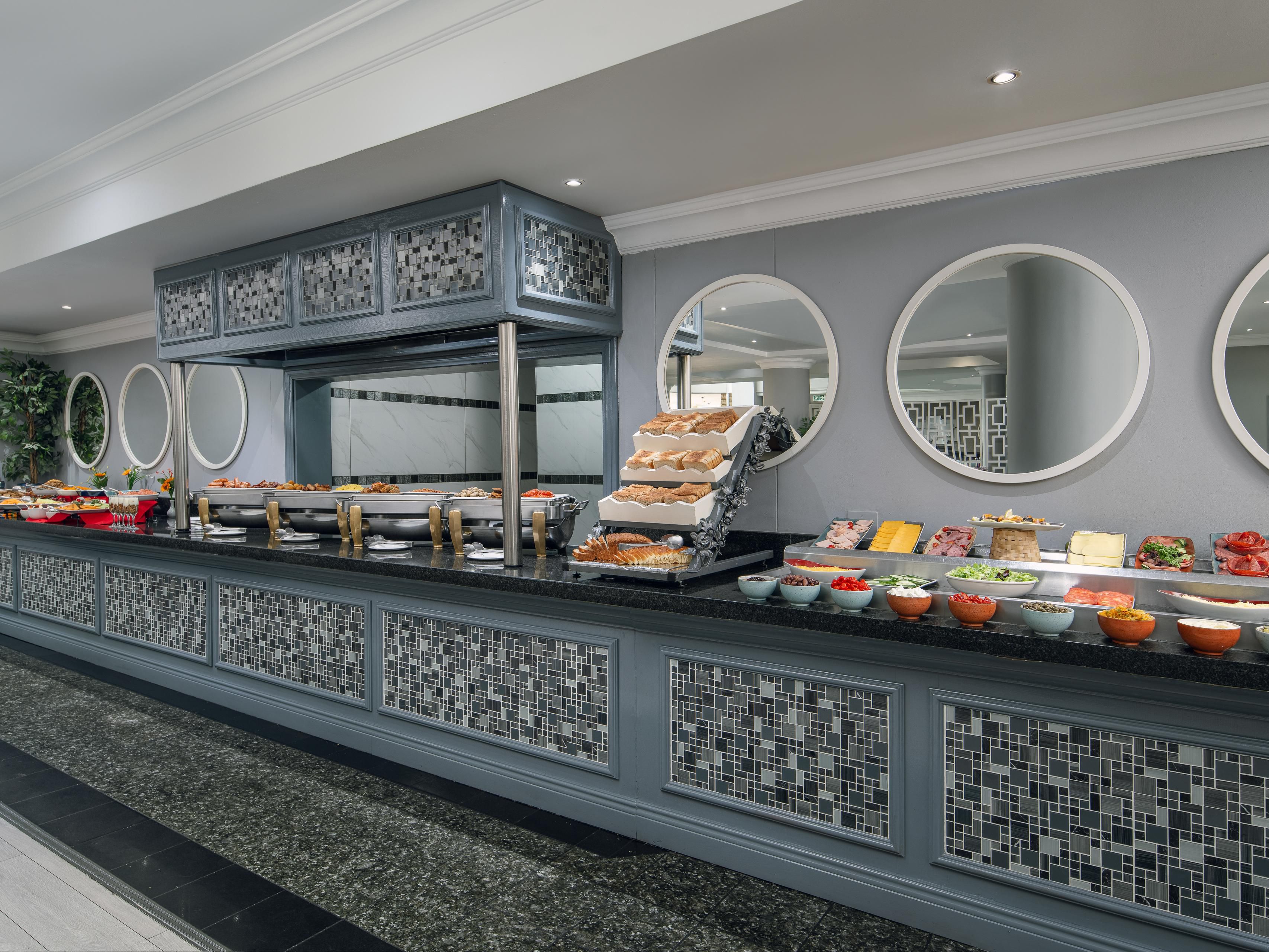 Start the day off with a hearty breakfast buffet and a selection of teas and coffees. Enjoy a welcome beverage at our hotel bar followed by a delicious lunch while lazing out at the pool. Dinner? We have got you covered, with an a la carte or buffet option. Choose a bottle of South African wine to wash down your meal.