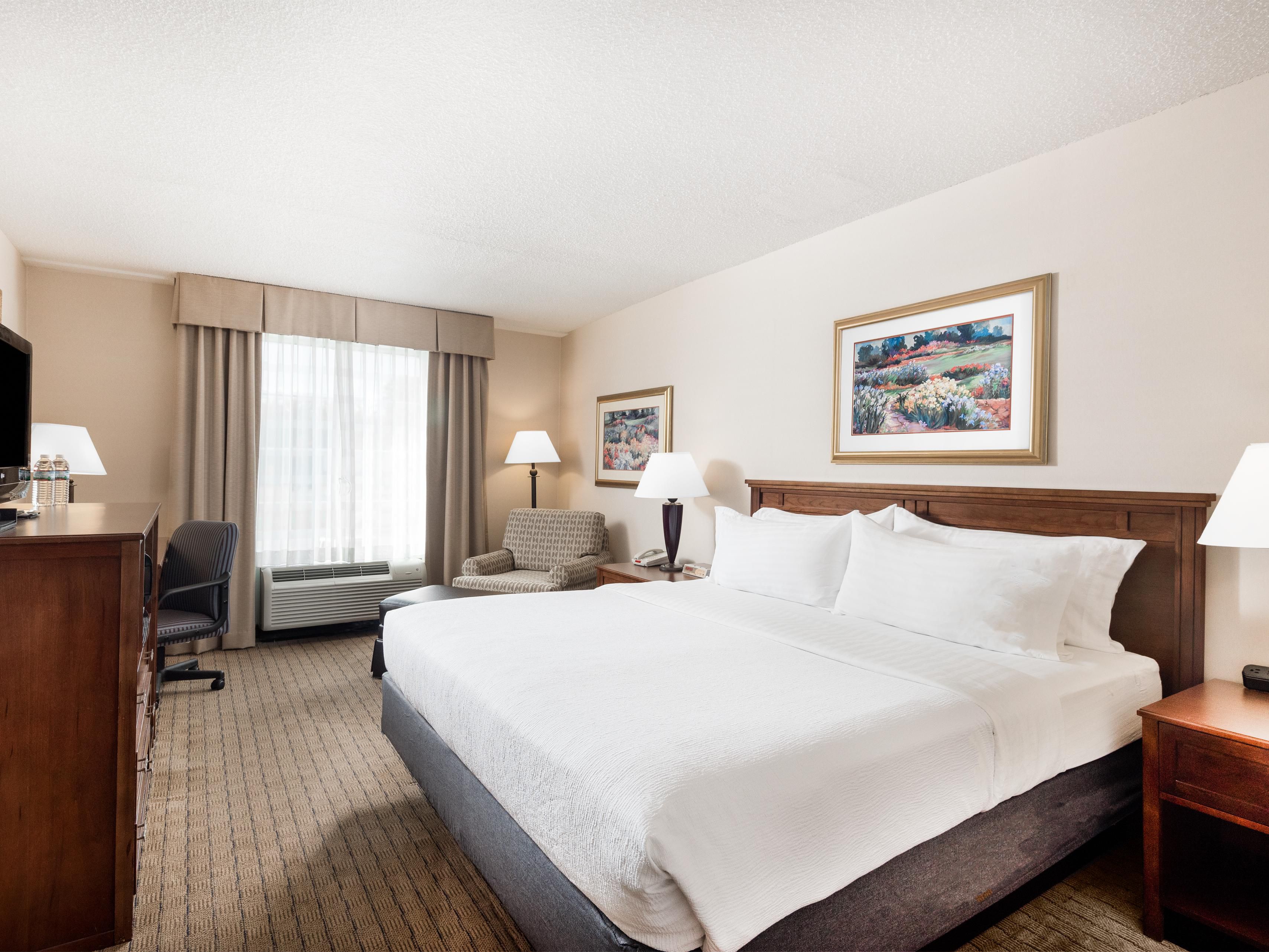 Singles offering A King bed with View and Queen bed at pool level; both with a sofa sleeper for guest convenience. Doubles offering two Queen Beds. Wide array of handicap rooms to accommodate any guest needs, including hearing impaired rooms. Newly renovated pool level. Keurig coffee makers, mini fridge, safe, ironing board/hangers in every room. 