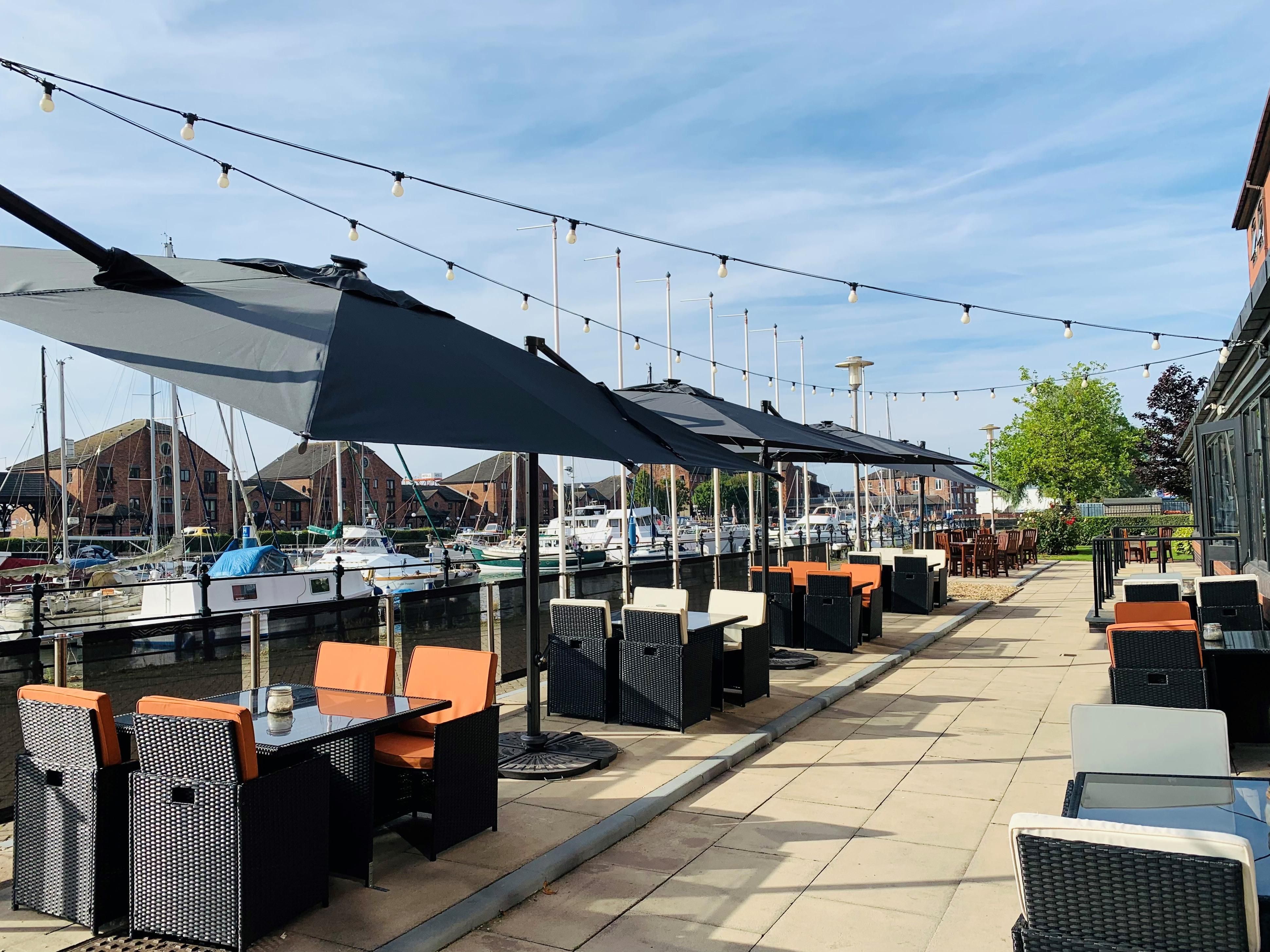 Take a seat on our terrace overlooking Hull Marina and watch the world go by with a cold beverage, Starbucks coffee or a bite to eat.
