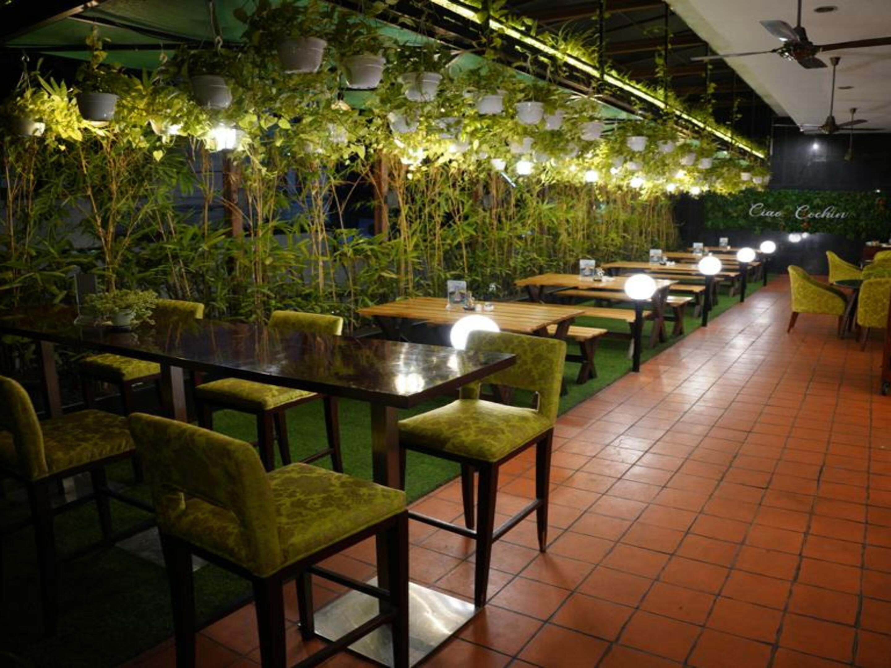 Relish authentic Italian flavours that dance on your palate at Ciao Cochin, an Italian trattoria. Here, under the canopy of the sky, enjoy a symphony of fresh ingredients and traditional recipes, as the open-air setting enhances every bite with the gentle embrace of the breeze. Savour life’s finest pleasures in an exquisite, alfresco escape.