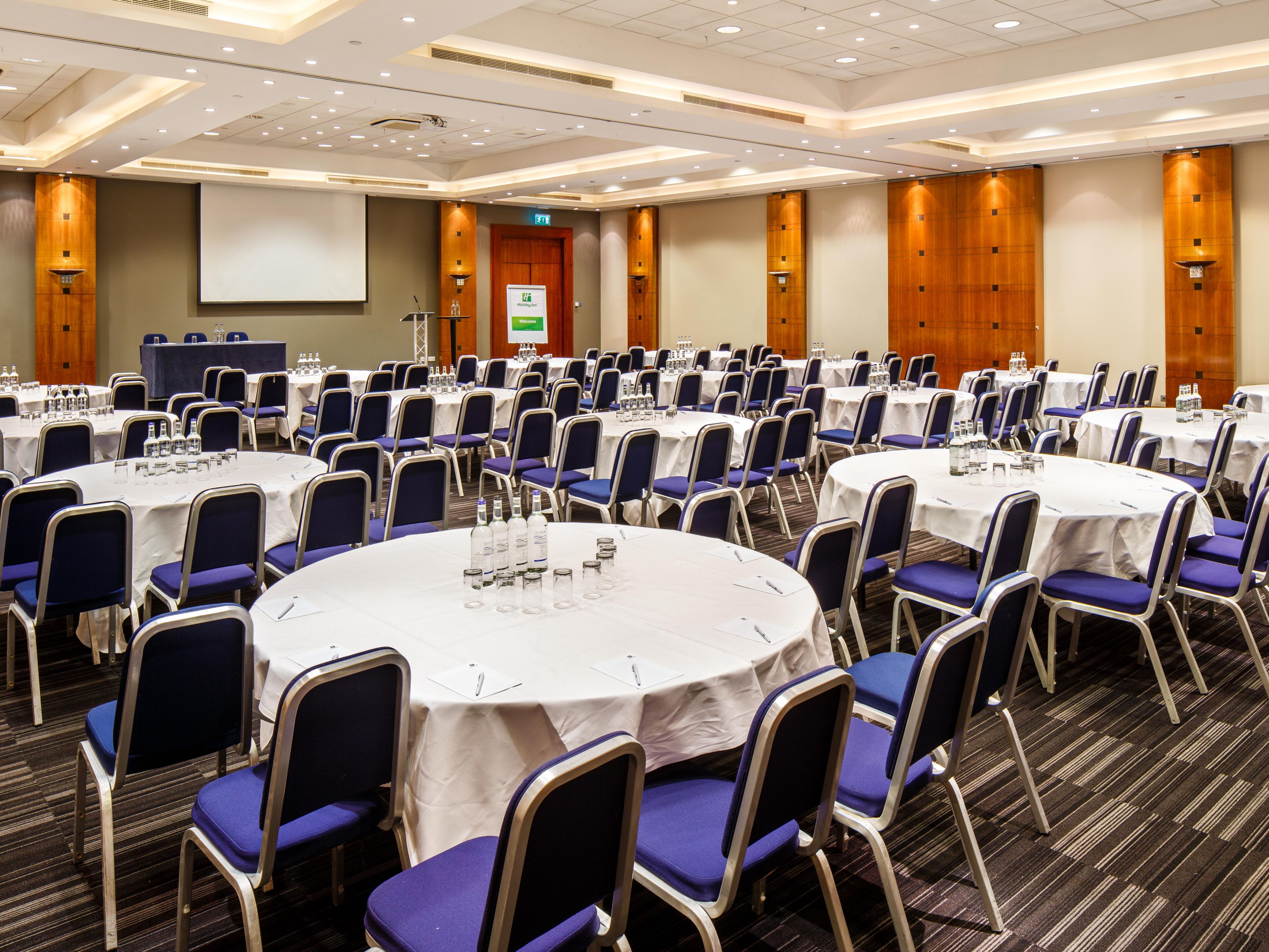 Host business meetings, training sessions, or celebrations in our flexible event spaces. With space for up to 300 guests, built-in video conferencing, and friendly on-site support, hosting your event here is simple. Whether you're planning a small board meeting or a wedding reception, our flexible venues can be tailored to fit your vision. 