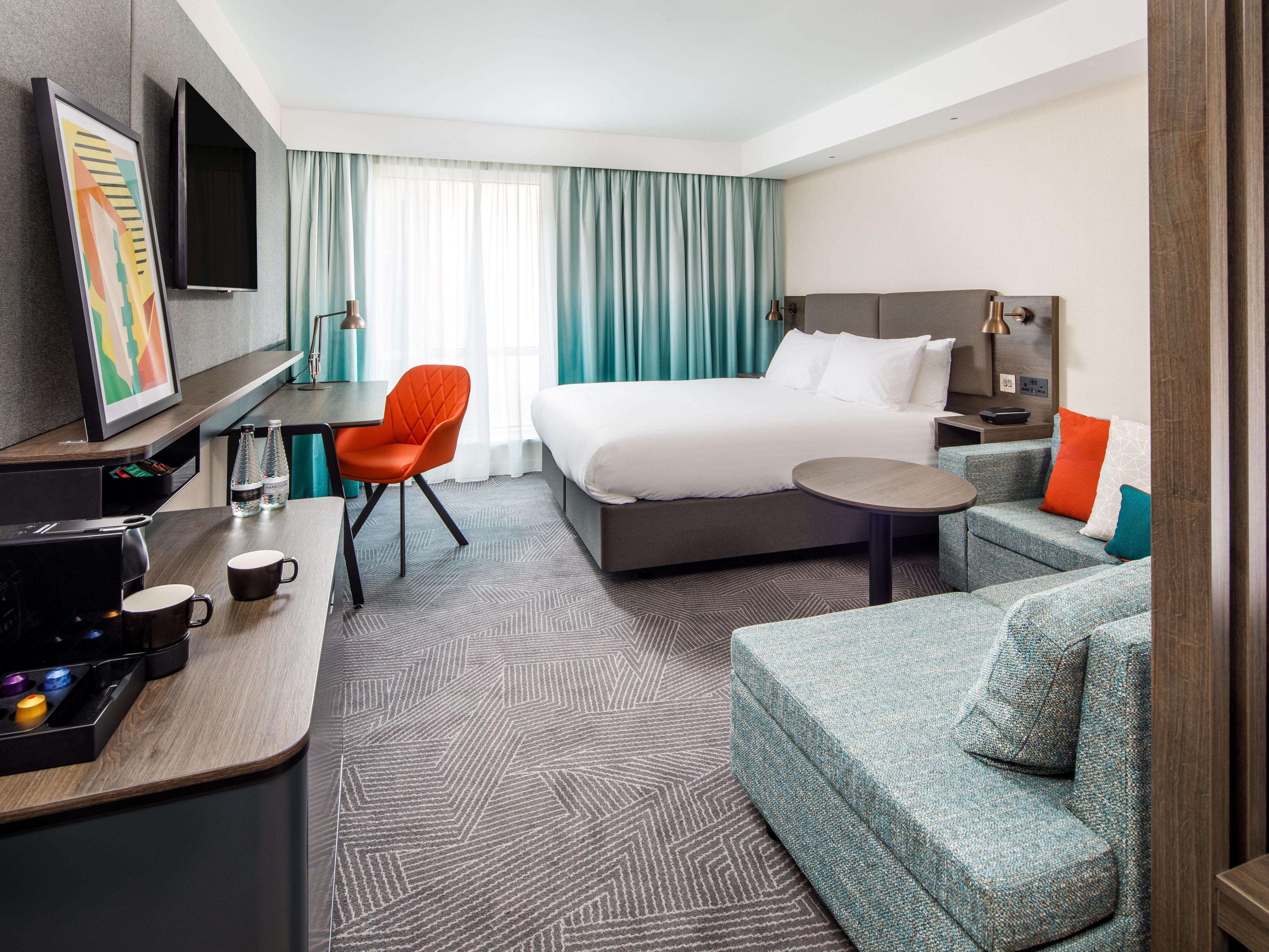 Complimentary wine, beer, soft drinks & snacks in premium rooms