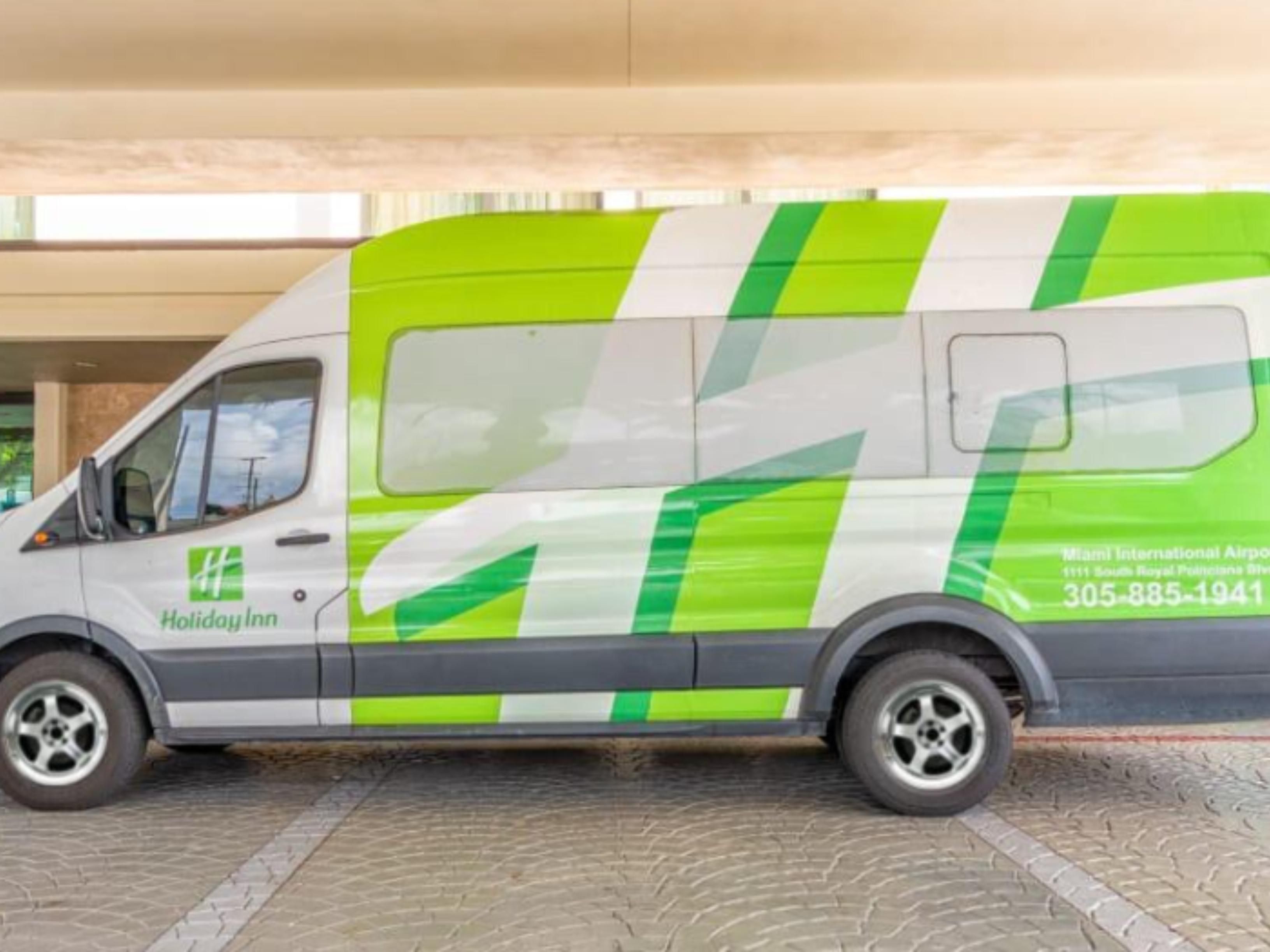 We offer complimentary airport shuttle pick up 24 hours a day. Please see the signage at the airport for Hotel Shuttle Service. You may also park your car and fly away with our parking package. 