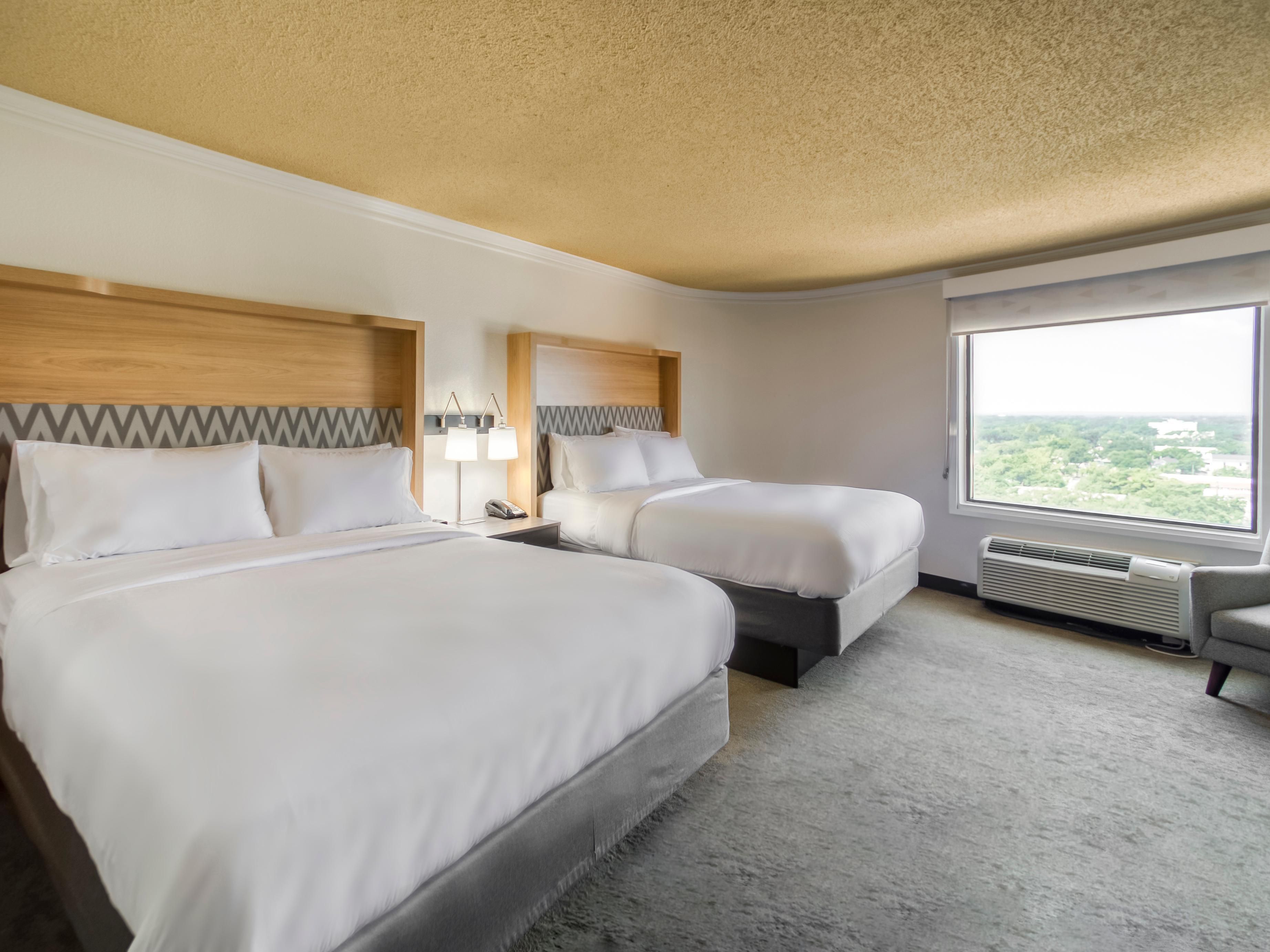 Enjoy breathtaking views from our 17th-floor guest rooms. Overlooking the bay, Government Street, and the downtown area, these rooms offer a stunning perspective of the city's vibrant landscape and serene waters. Experience the best vantage point, capturing the essence of the area from high above.