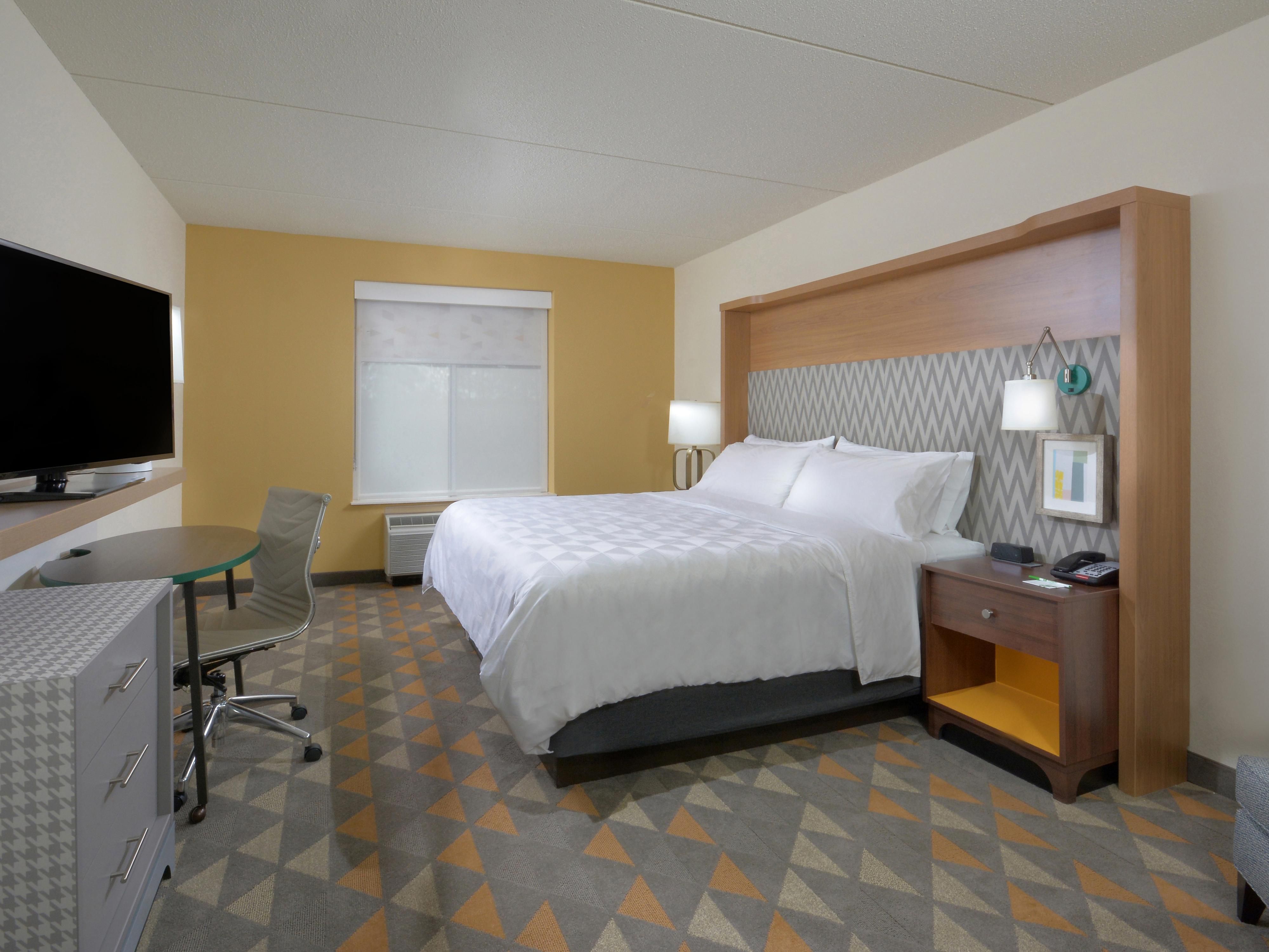 True black out shades and boutique-style bedding await you.