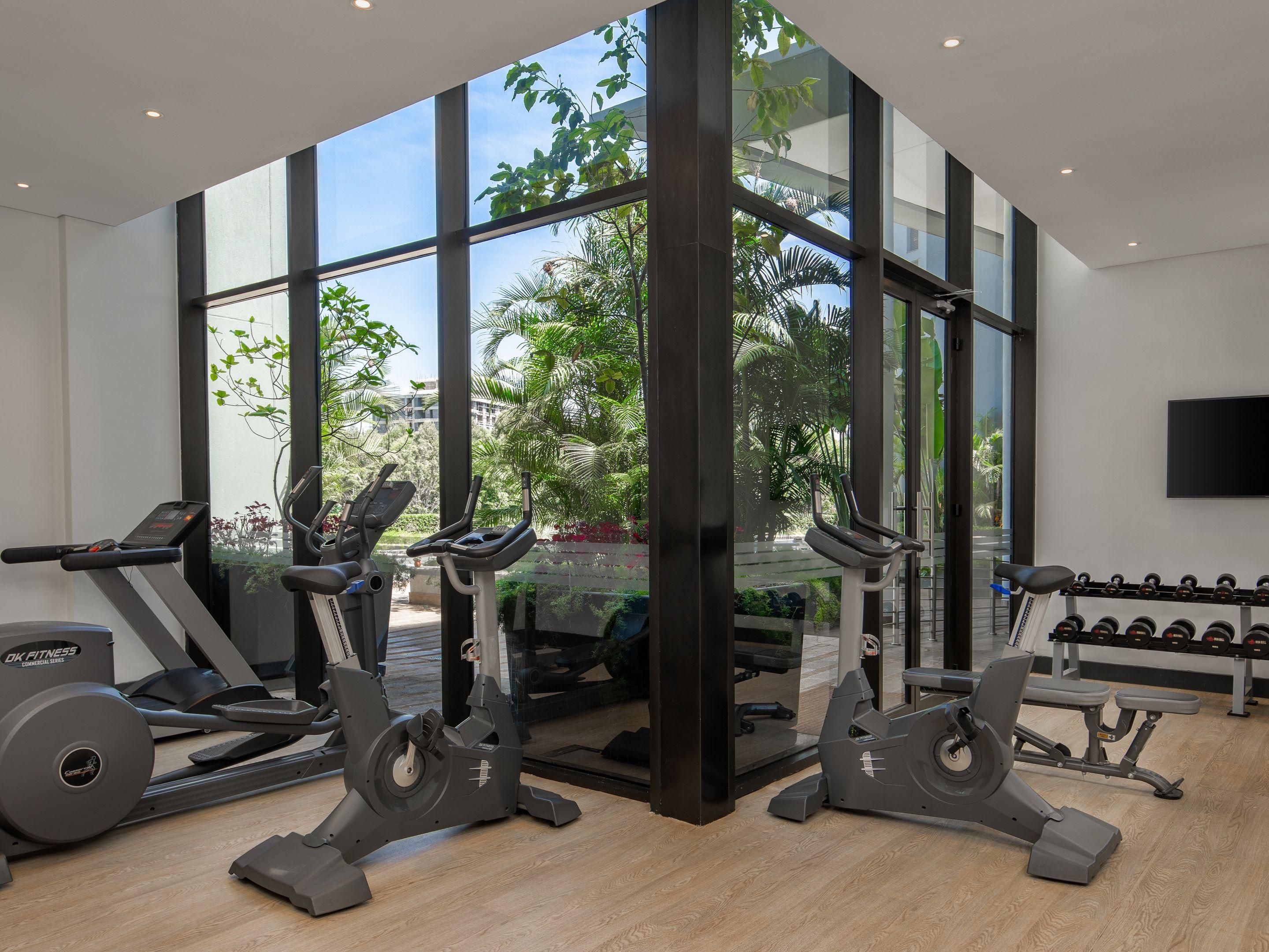 Stay energised at our gym, where natural daylight and pool terrace views set the scene for a rewarding workout. From cardio machines to strength training, our well-equipped space caters to all fitness levels. Unroll a yoga mat, sip complimentary water, and embrace a revitalising moment tailored to your wellness routine.