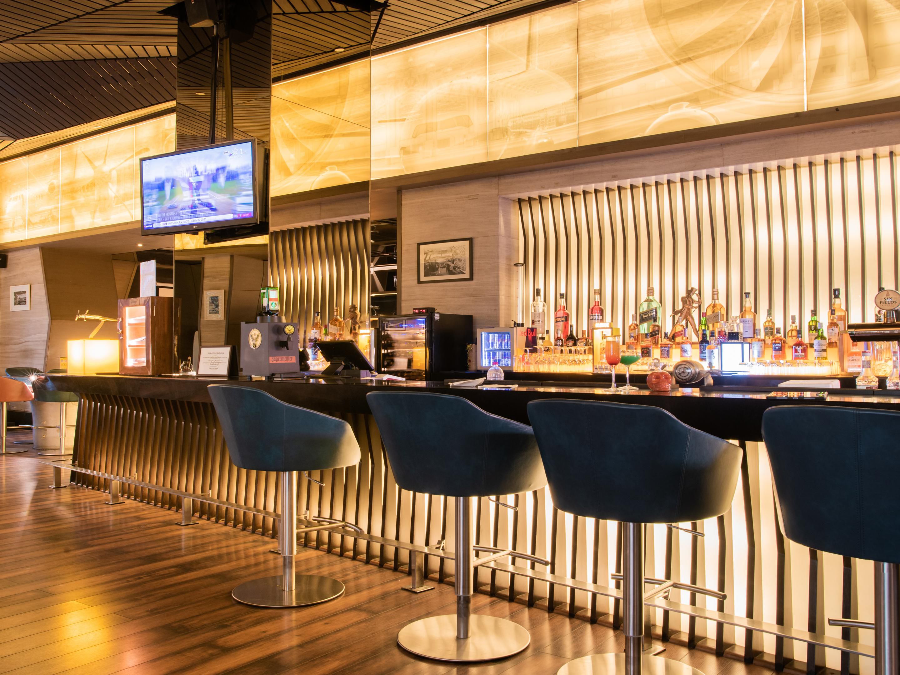 Plan your next hangout at The Hangar Lounge & Bar and spice up your evenings with an amazing collection of concoctions & international spirits. The relaxing ambiance and soothing lighting will set your mood rolling and will keep you asking for more.  
Special packages are available for parties and group bookings.
For Bookings: +91 8130496069.