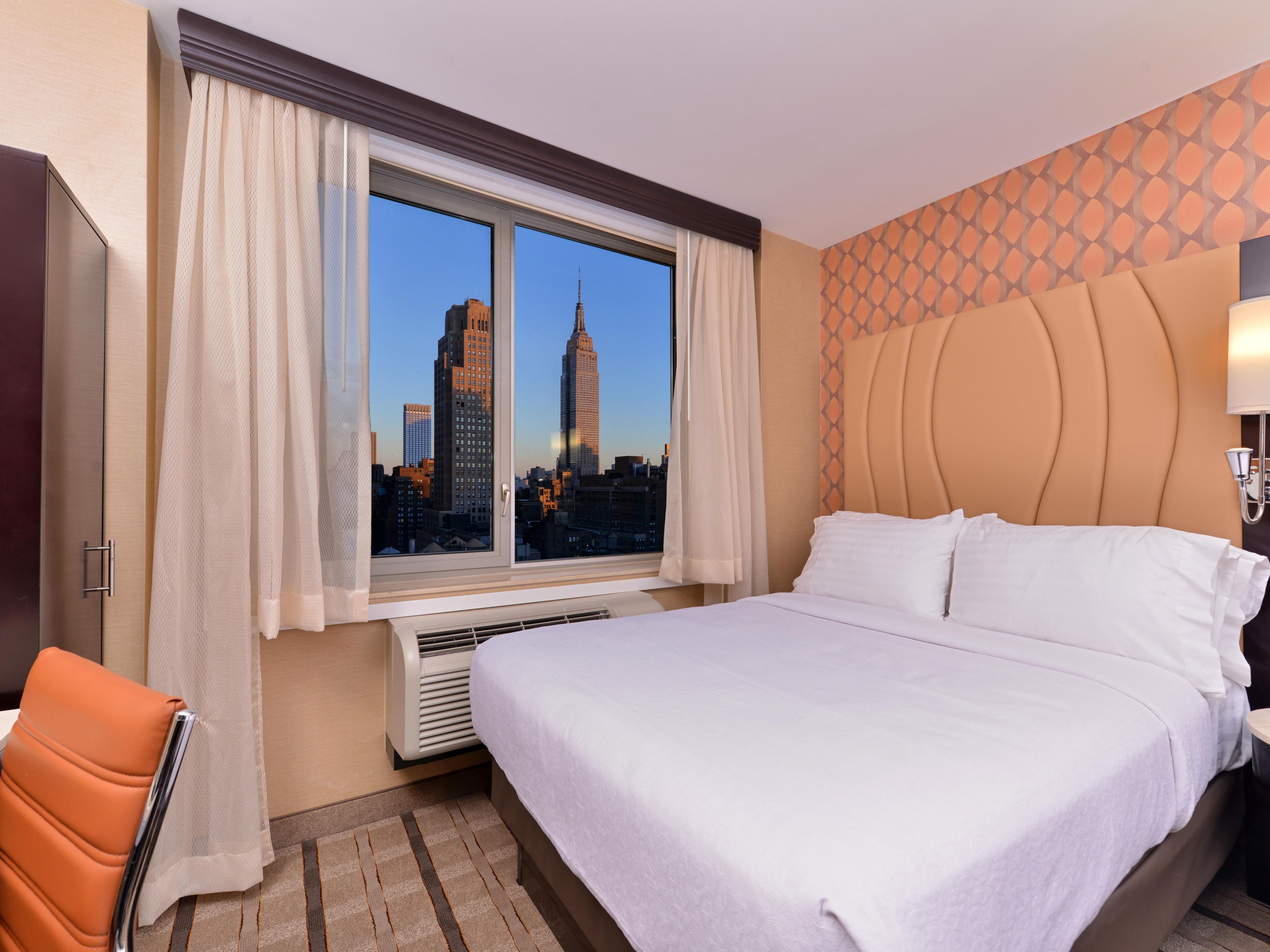 Upgrade your NYC experience with breathtaking views of Manhattan and the Hudson River from select room types. 