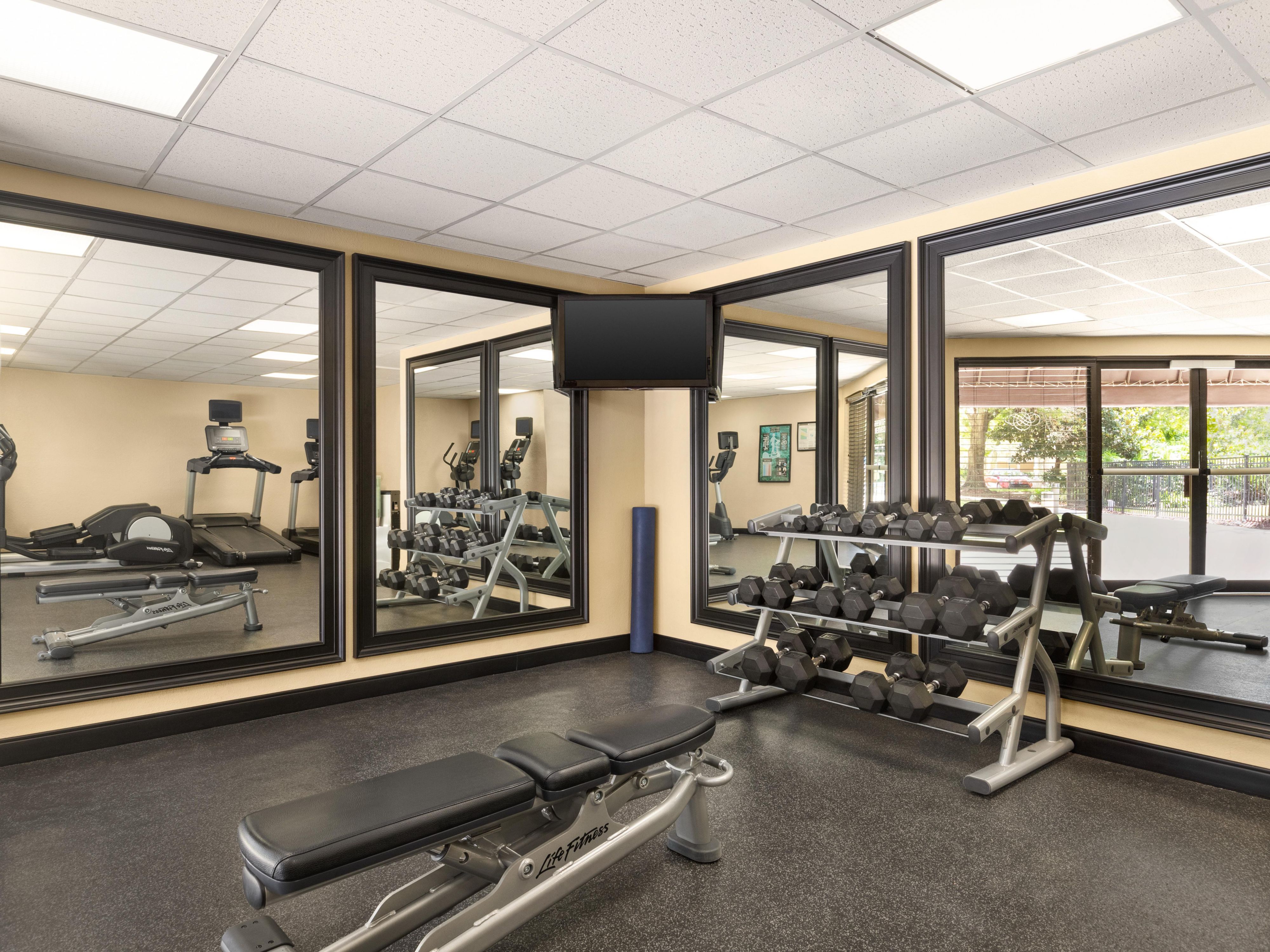 Don't settle for a basic fitness center when you can enjoy the latest, as well as a full basketball and tennis court